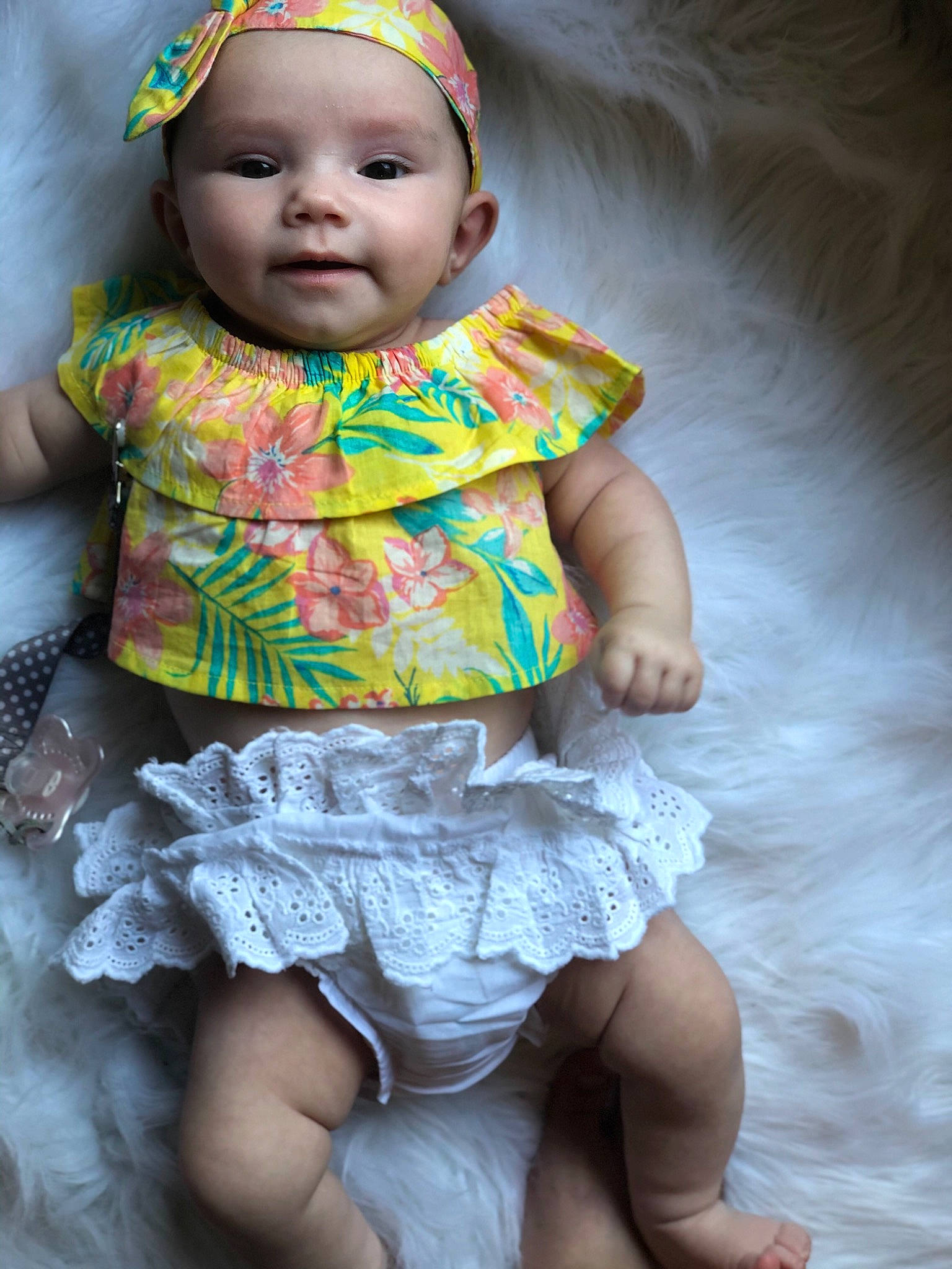 Jolie is registered to the contest to win money with this photo: baby, baby_toddler_clothing, cheek, child, fashion_accessory, fun, hair_accessory, happy, headgear, headwear, pattern, person, photography, pink, play, product, skin, smile, textile, toddler