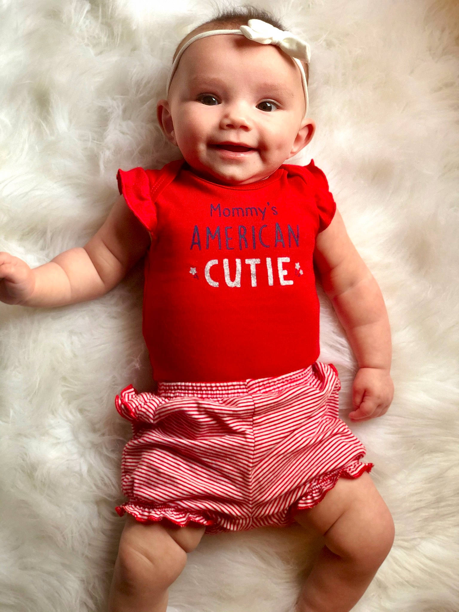 Jolie is registered to the contest to win money with this photo: baby, baby_toddler_clothing, blond, cheek, child, child_model, design, dress, facial_expression, head, human, joy, leg, lip, nose, person, pink, product, red, skin