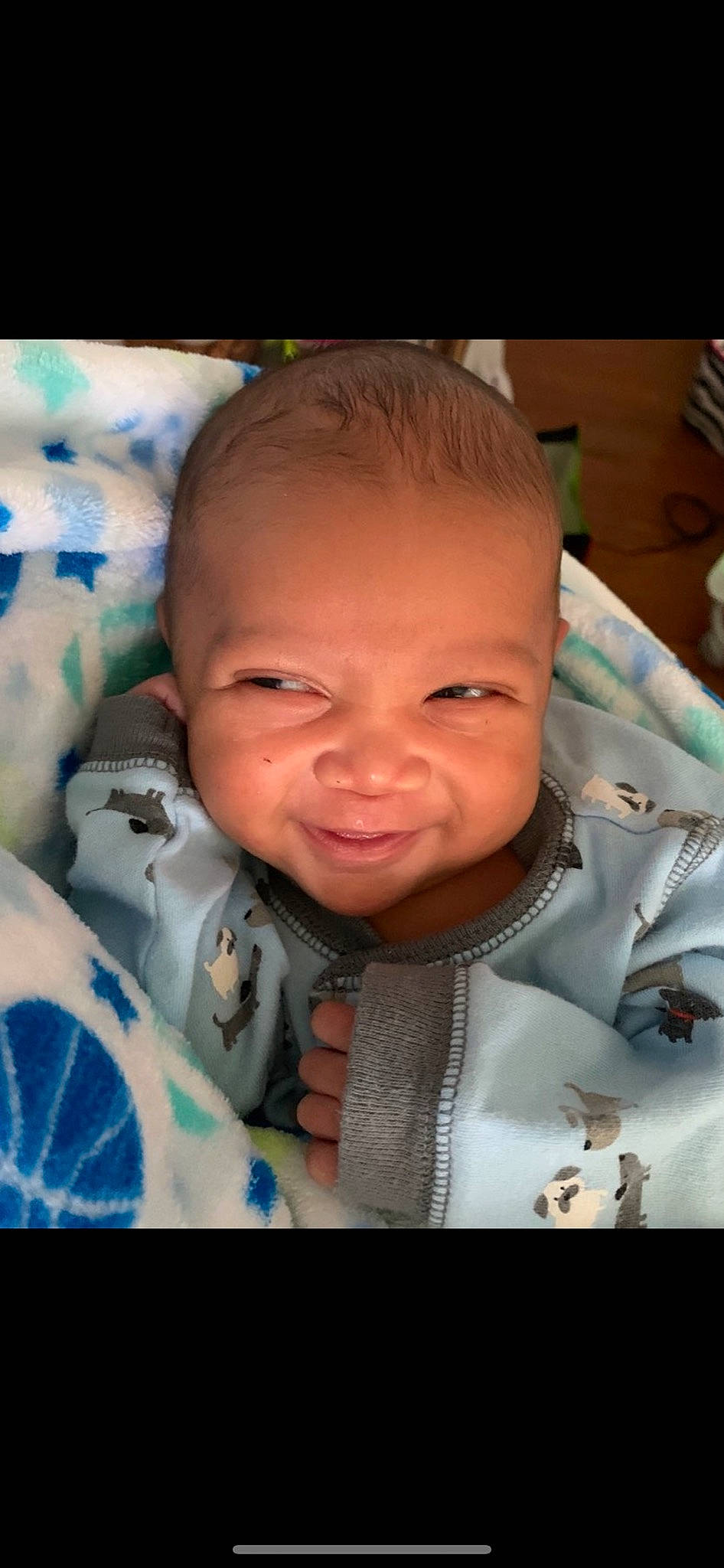 Tylan is registered to the contest to win money with this photo: baby, cheek, child, chin, ear, eye, eyebrow, face, facial_expression, forehead, head, iris, lip, mouth, nose, person, skin, smile, toddler