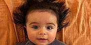 Chalom a rejoint le concours — aidez-le/la à gagner de superbes lots ! baby, clothing, couch, cushion, face, furniture, hair, happy, head, homedecor, longsleeve, mohawkhairstyle, pants, person, photography, portrait, sleeve, smile, t_shirt, wood