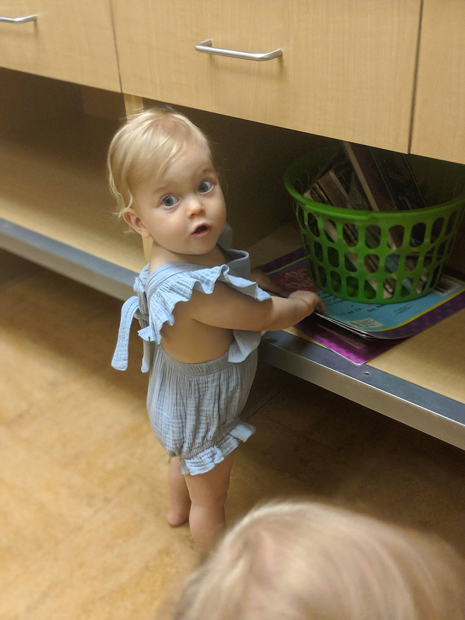 Jade is registered to the contest to win money with this photo: baby, child, floor, flooring, person, play, room, skin, standing, surprise, toddler