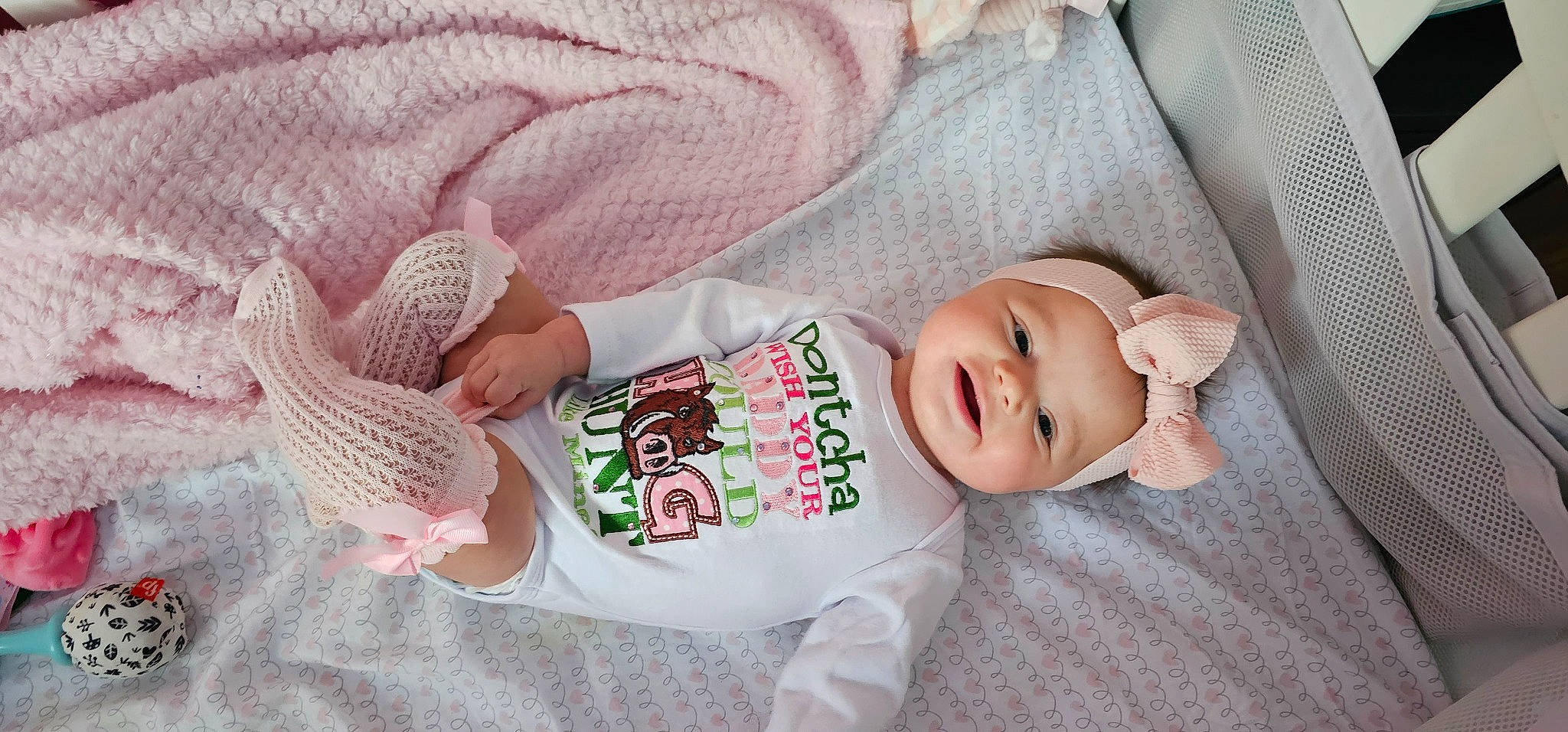 Stella is registered to the contest to win money with this photo: baby, baby_toddler_clothing, beauty, cheek, child, comfort, finger, hand, hat, head, headwear, mammal, organ, pattern, person, pink, product, skin, sleeve, smile