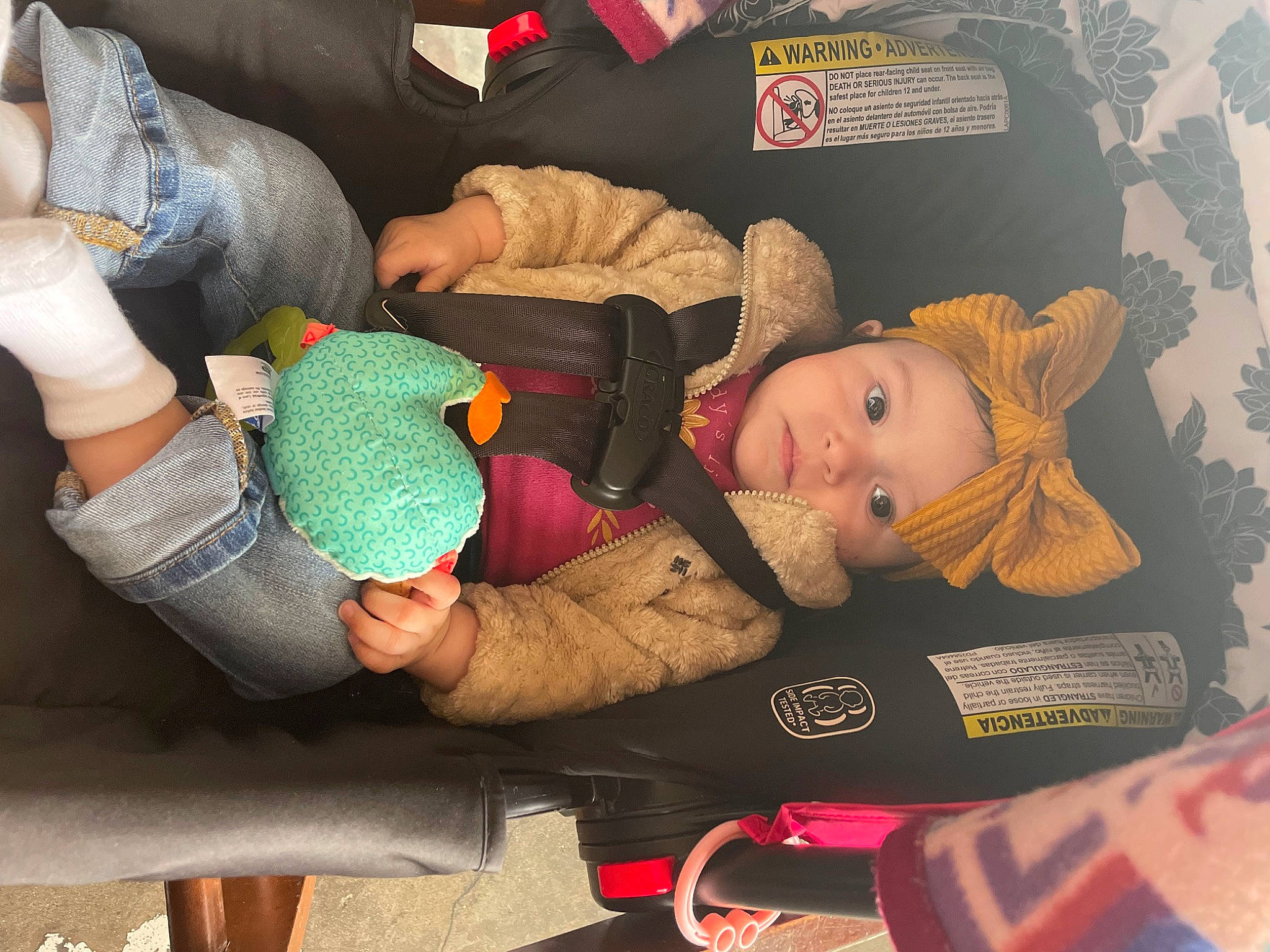 Raiya is registered to the contest to win money with this photo: arm, child, comfort, finger, fun, gesture, hand, human_body, interaction, joint, lap, linens, person, plush, product, room, sitting, stuffed_toy, textile, thigh