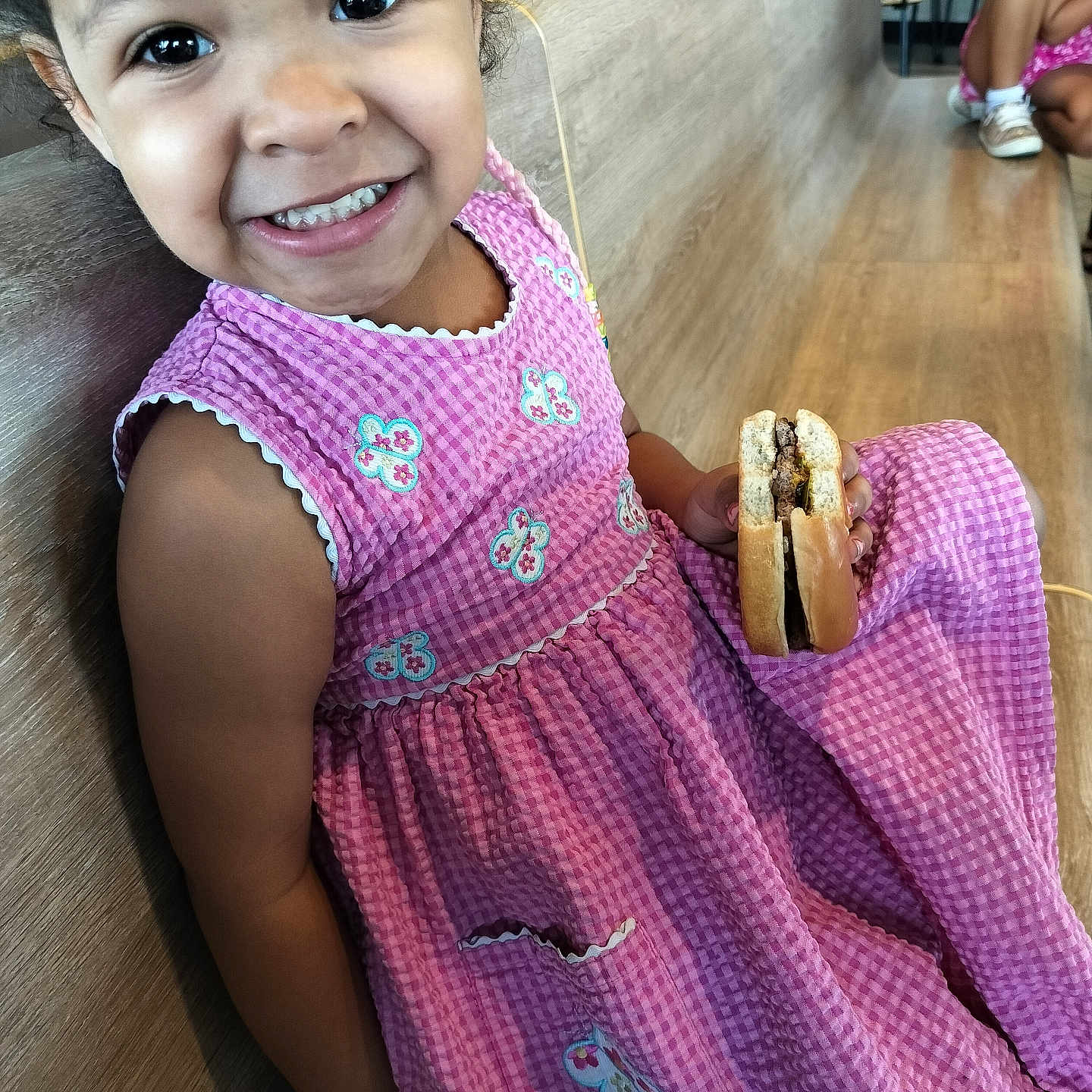 Jayanna joined the competition — help win amazing prizes! bread, child, clothing, couch, dress, face, female, food, footwear, furniture, girl, hardwood, head, lunch, meal, person, photography, portrait, shoe, wood