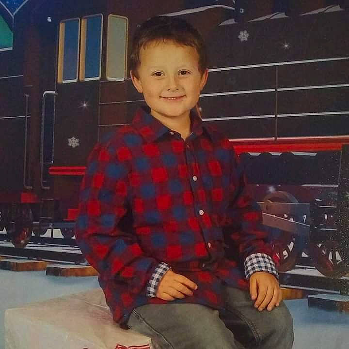 Zayn is registered to the contest to win money with this photo: boy, child, cool, design, fun, joy, male, outerwear, pattern, person, plaid, product, smile, standing, tartan, toddler