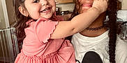 Saffire is registered to the contest to win money with this photo: accessories, cabinet, child, closet, clothing, cup, cupboard, dress, face, female, furniture, girl, head, indoors, jewelry, necklace, person, photography, portrait, t_shirt