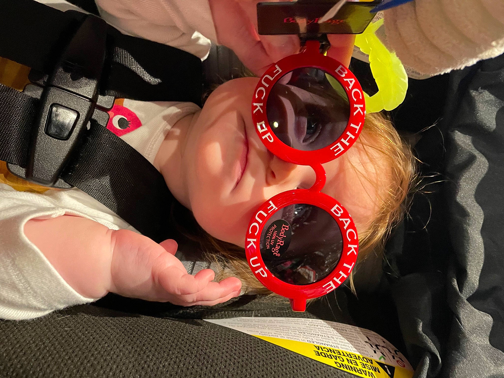 Georgia is registered to the contest to win money with this photo: audio_equipment, automotive_lighting, chest, elbow, eyewear, finger, fun, gesture, glasses, glove, goggles, hand, helmet, nail, person, personal_protective_equipment, sports_gear, sunglasses, thigh, vision_care