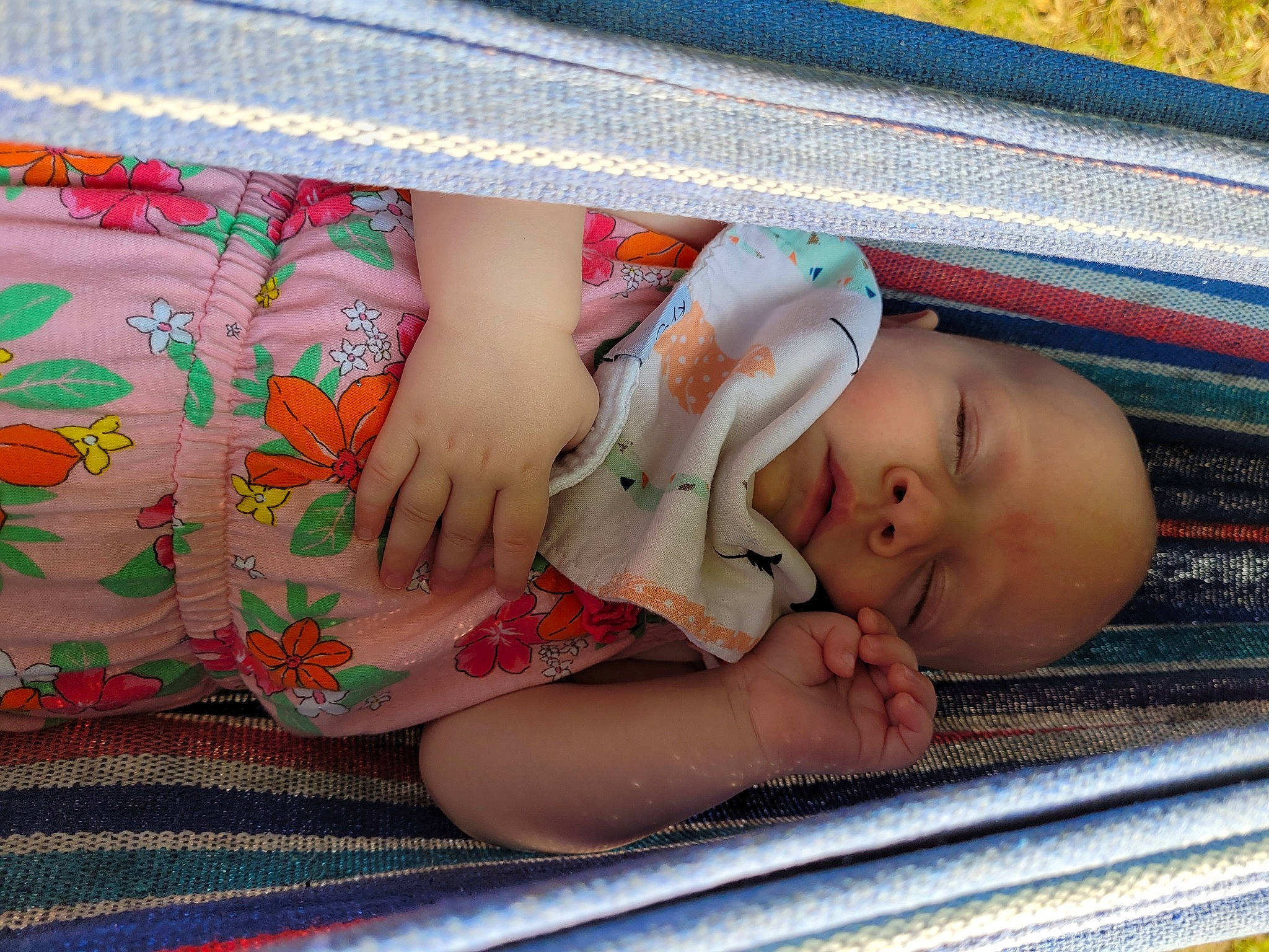 Aubrie is registered to the contest to win money with this photo: arm, baby, baby_products, baby_toddler_clothing, child, comfort, eye, finger, grass, hand, human_body, leg, linens, mammal, nail, person, product, skin, thumb, toddler