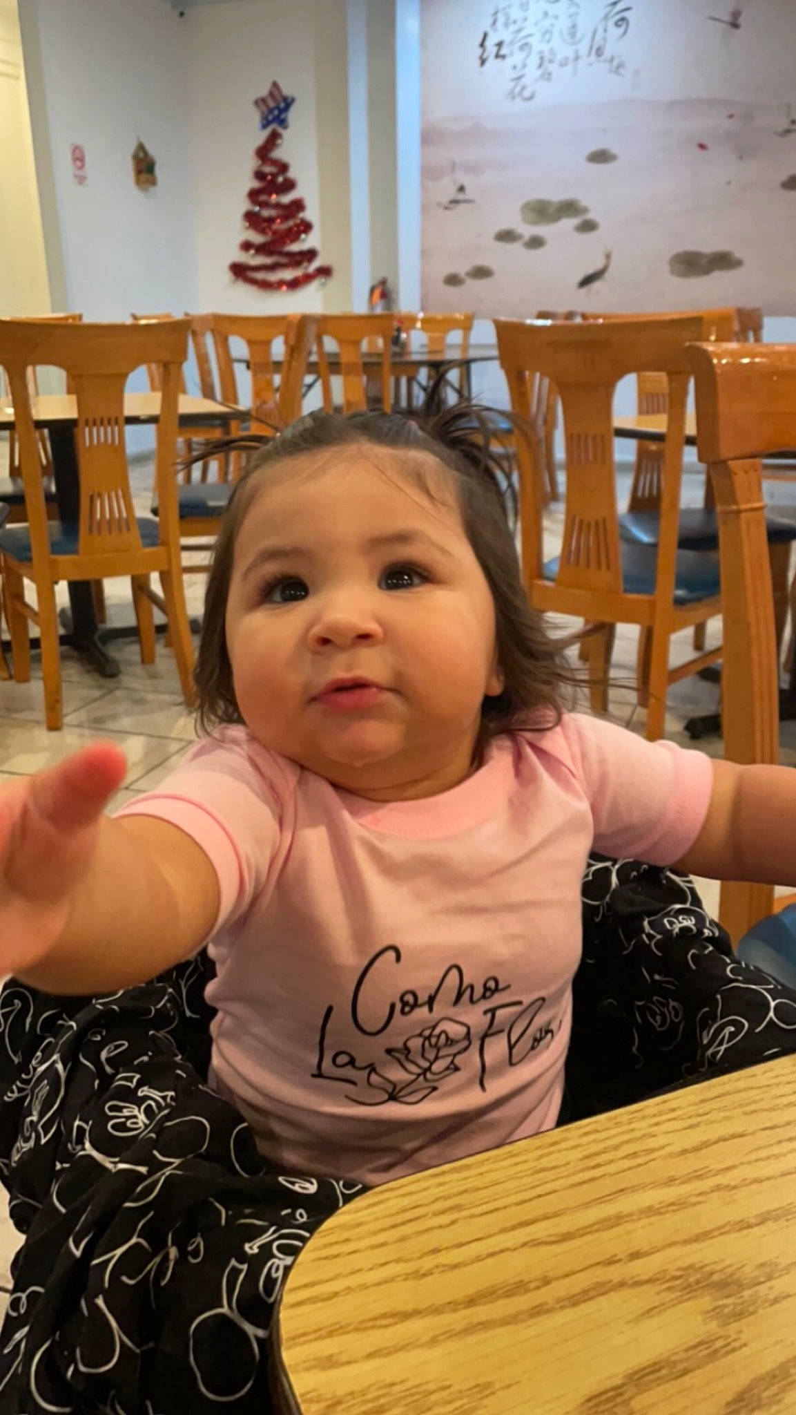 Selena joined the competition — help win amazing prizes! baby, baby_toddler_clothing, chair, cheek, child, event, face, finger, fun, furniture, happy, headwear, leisure, people, person, room, sitting, skin, t_shirt, toddler