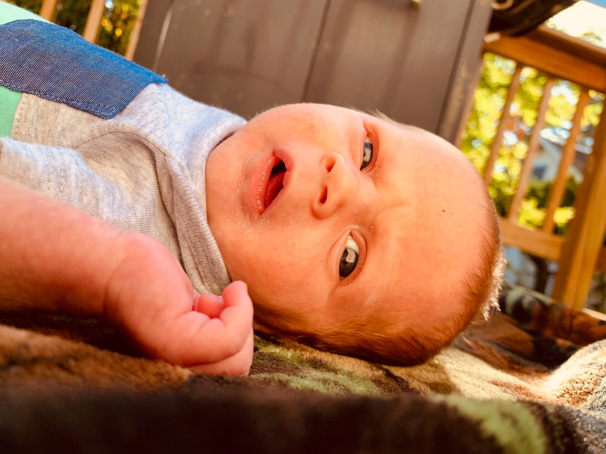 Drake is registered to the contest to win money with this photo: baby, cheek, child, chin, close_up, ear, eye, face, finger, head, mouth, nose, person, skin, smile, toddler