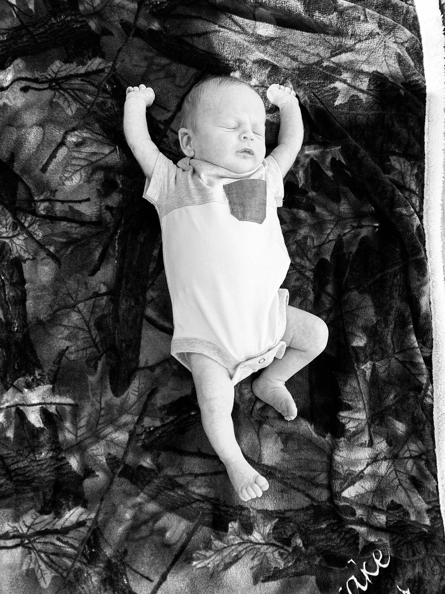 Drake is registered to the contest to win money with this photo: baby, beauty, black, black_and_white, branch, child, happy, monochrome, monochrome_photography, people_in_nature, person, photo_shoot, photograph, photography, portrait, portrait_photography, rock, smile, standing, stock_photography