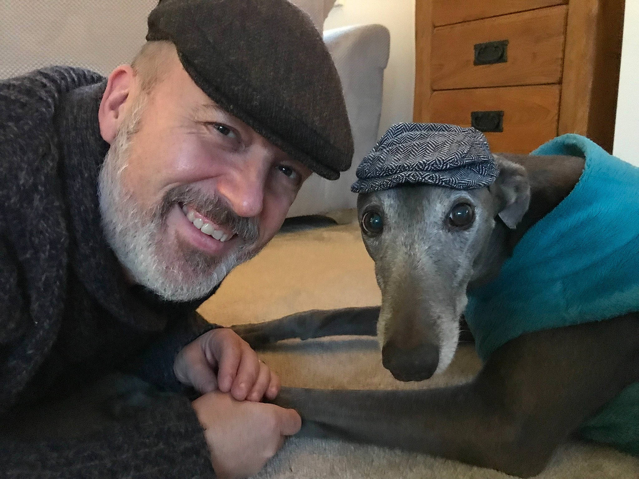 Cooper joined the competition — help win amazing prizes! beard, cabinetry, cap, carnivore, companion_dog, dog, dog_breed, drawer, dresser, eye, facial_hair, fawn, fun, head, jaw, knit_cap, moustache, smile, snout, working_animal