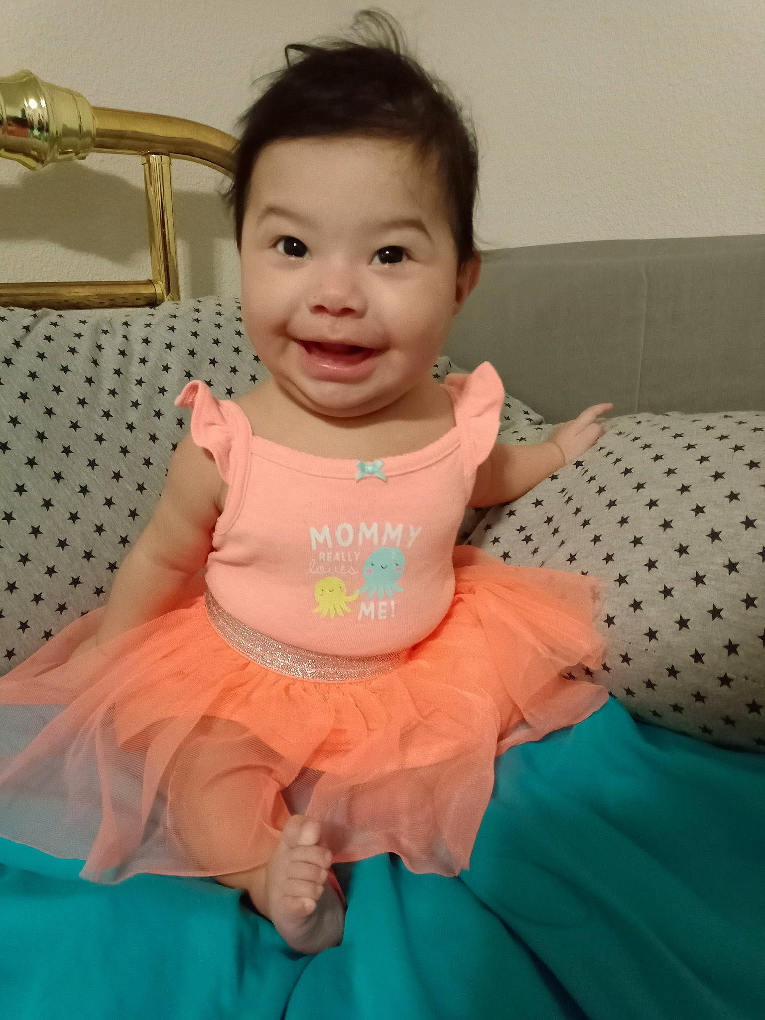 Alita joined the competition — help win amazing prizes! arm, baby, baby_toddler_clothing, cheek, day_dress, eye, eyelash, face, fun, happy, iris, joy, person, pink, product, ruffle, shoulder, skin, sleeve, smile