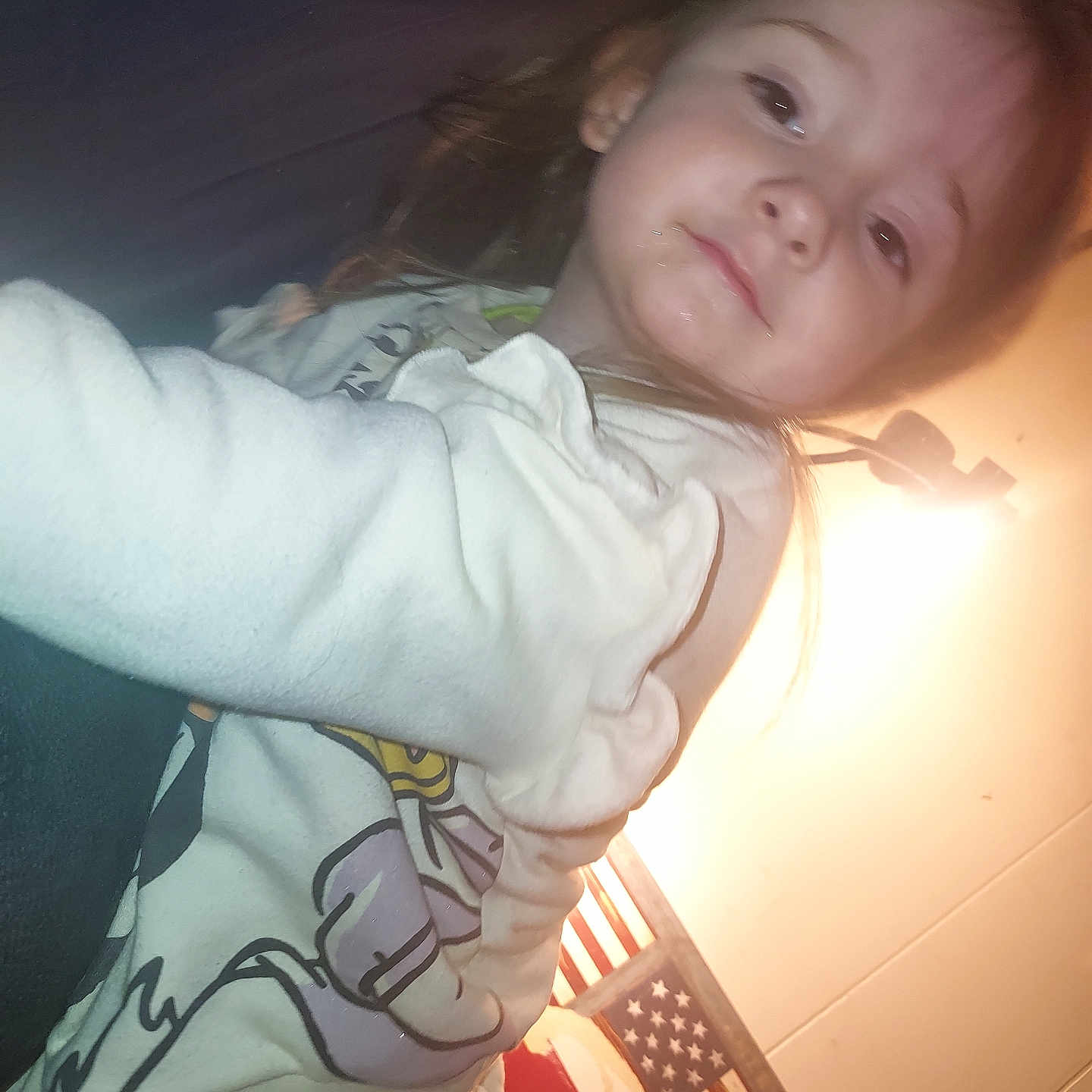 Hope is registered to the contest to win money with this photo: americanflag, baby, birthdaycake, bodypart, cake, clothing, cream, face, finger, flag, hand, head, knitwear, longsleeve, person, photography, portrait, sleeve, sweater, t_shirt