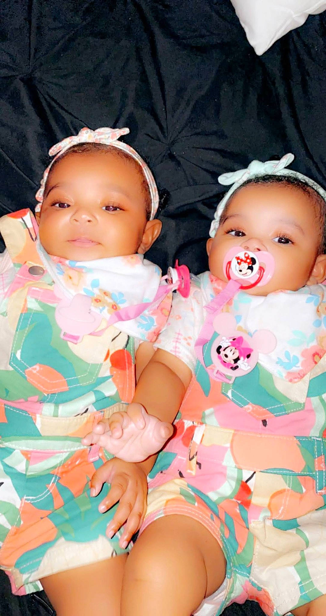 Lori'Elle is registered to the contest to win money with this photo: baby_toddler_clothing, cheek, eye, face, facial_expression, gesture, happy, head, human, human_body, lip, mouth, nose, organ, person, pink, product, skin, sleeve, textile