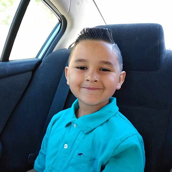 Fernando joined the competition — help win amazing prizes! auto_part, automotive_window_part, blue, car, car_seat, child, driving, face, family_car, joy, luxury_vehicle, person, sitting, skin, smile, vacation, vehicle, vehicle_door