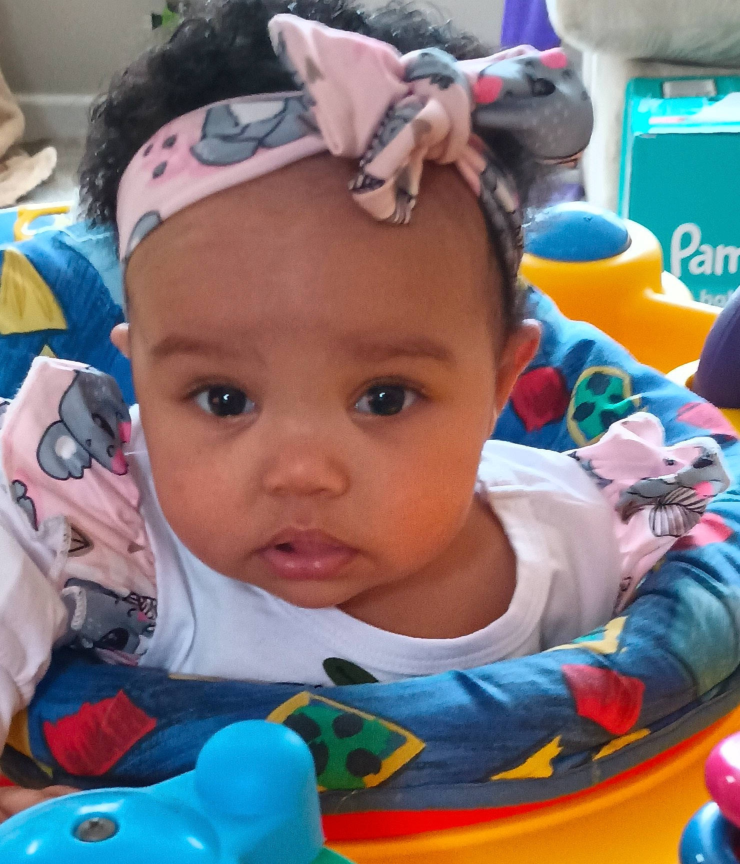 Rhylee is registered to the contest to win money with this photo: baby, baby_products, blue, cheek, child, event, eyelash, facial_expression, fashion_accessory, fun, green, happy, headwear, leisure, mouth, person, play, recreation, skin, snapshot