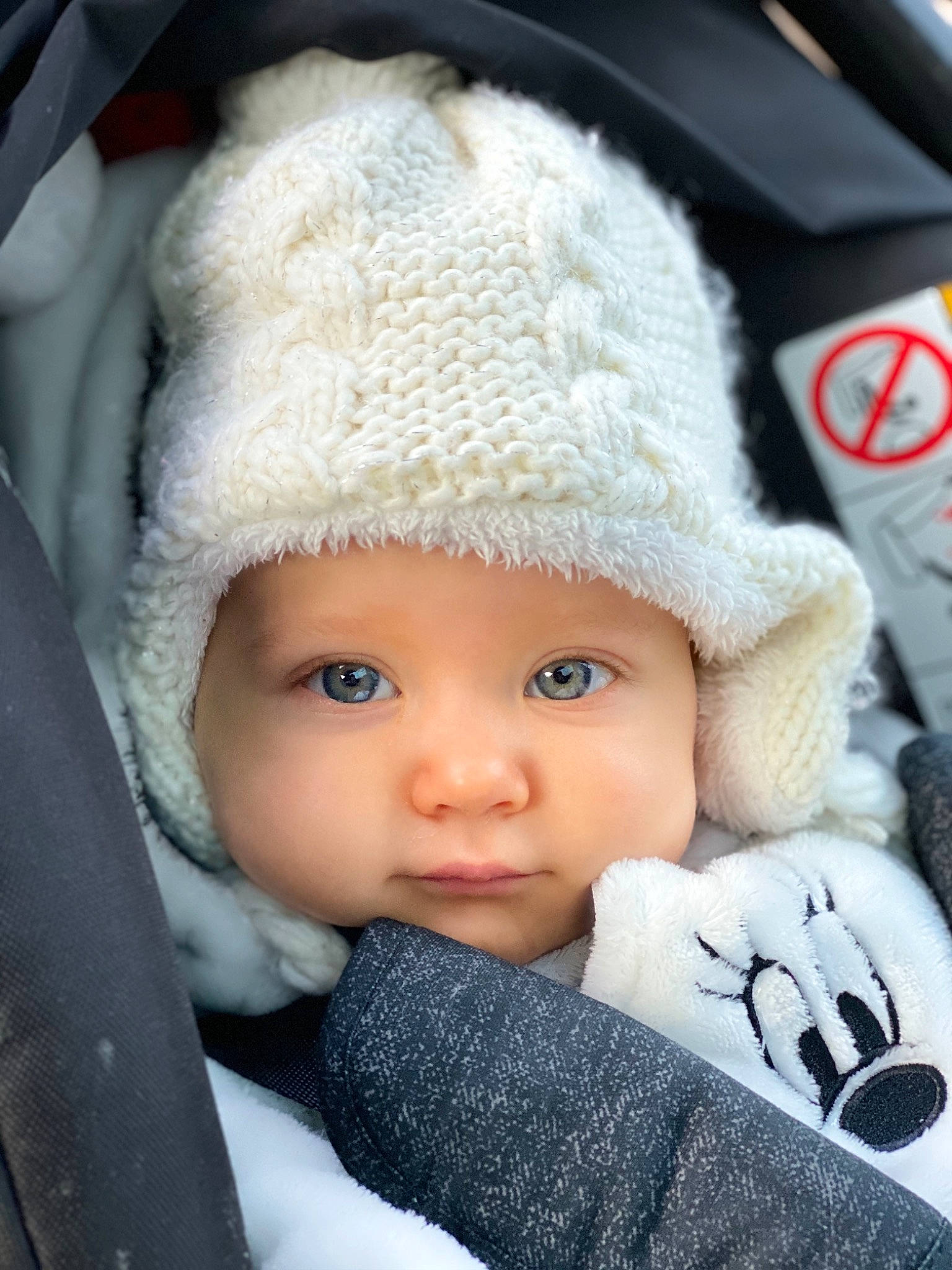 Milana a rejoint le concours — aidez-le/la à gagner de superbes lots ! baby, baby_carriage, baby_in_car_seat, baby_products, bonnet, cap, cheek, child, crochet, headgear, headwear, knit_cap, person, product, toddler, winter, wool