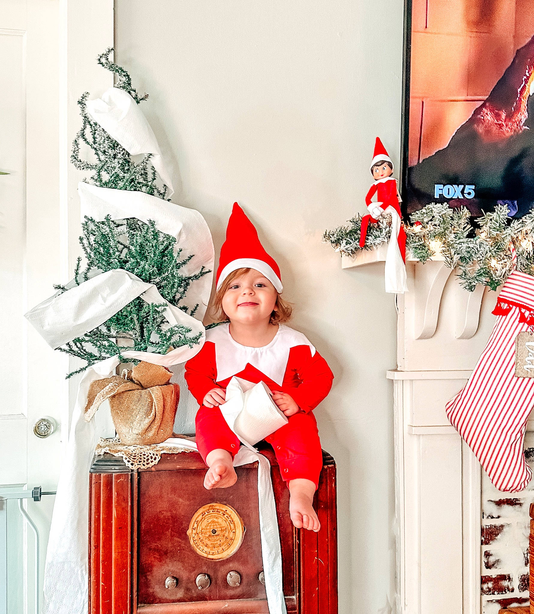 Esme joined the competition — help win amazing prizes! chair, christmas, christmas_decoration, christmas_eve, christmas_ornament, costume_hat, event, fictional_character, flag_day_usa, flag_of_the_united_states, hat, headwear, holiday, holiday_ornament, interior_design, joy, ornament, person, picture_frame, red