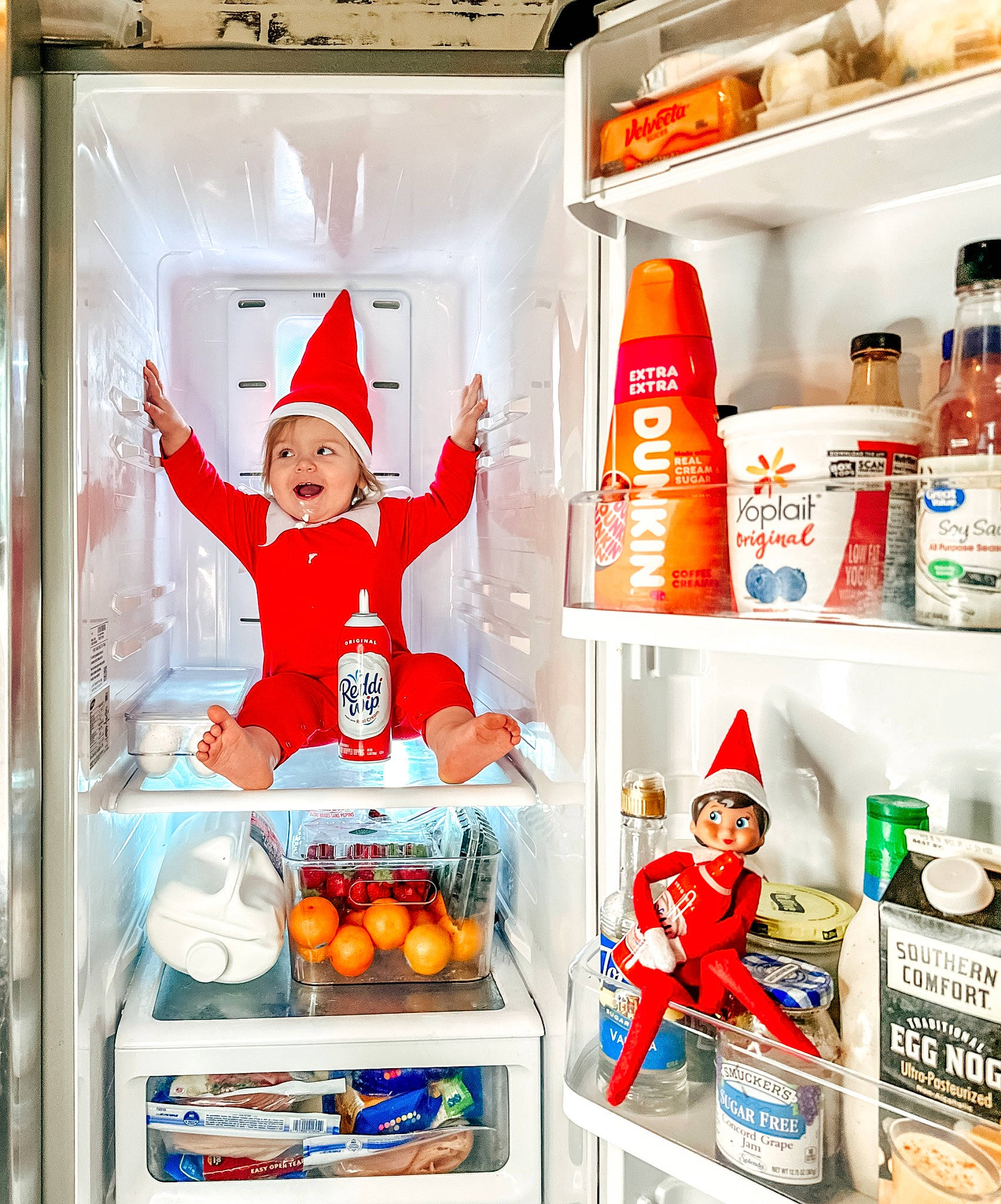 Esme joined the competition — help win amazing prizes! advertising, bottle, carbonated_soft_drinks, chef, cooking, drink, food_group, gas, headwear, home_appliance, kitchen_appliance, machine, major_appliance, orange, person, plastic_bottle, product, refrigerator, room, shelf