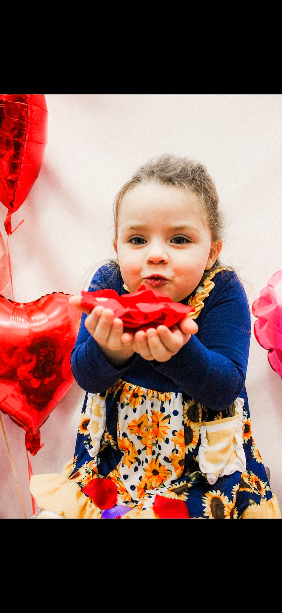 Breanna is registered to the contest to win money with this photo: beauty, child, dress, eating, event, face, facial_expression, food, food_craving, fruit, fun, happy, head, orange, people, person, plant, red, sweetness, toddler
