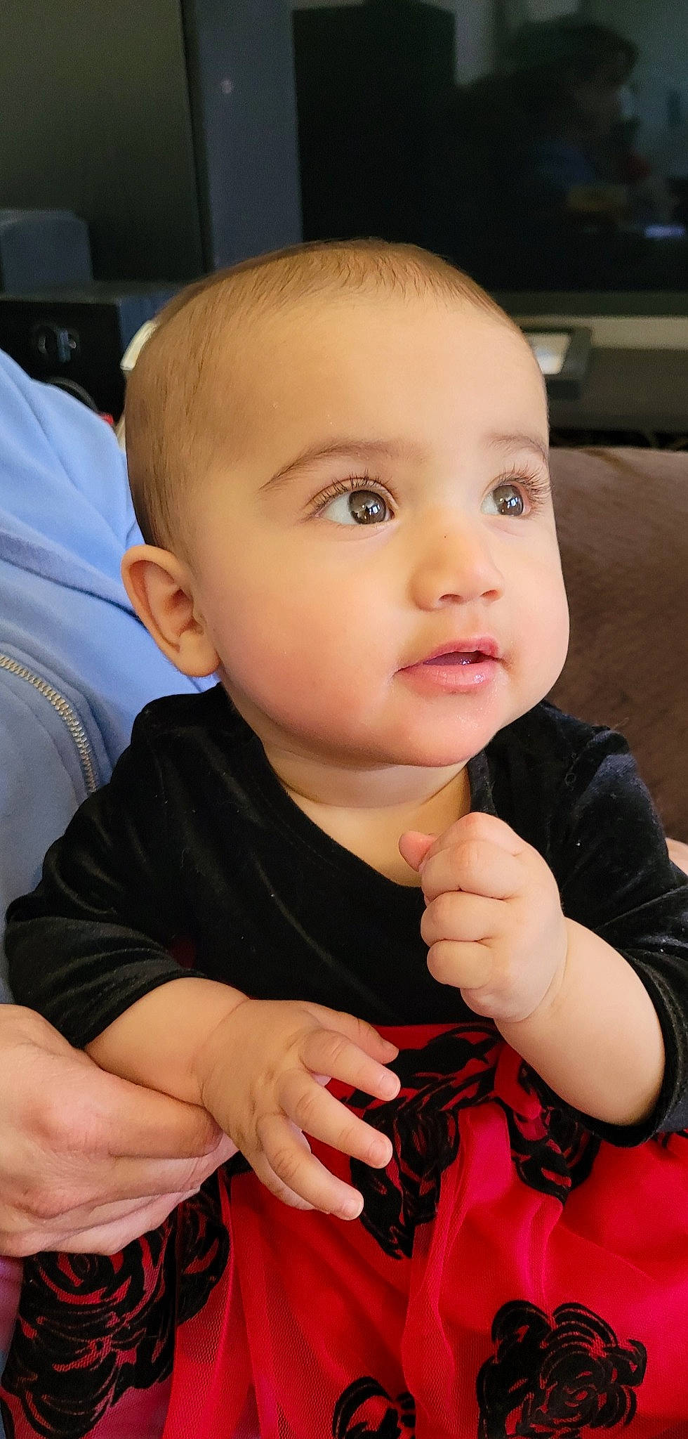 Erika is registered to the contest to win money with this photo: arm, baby, baby_toddler_clothing, cheek, chin, ear, eye, eyebrow, facial_expression, finger, gesture, hand, iris, lip, mouth, nose, person, product, skin, sleeve