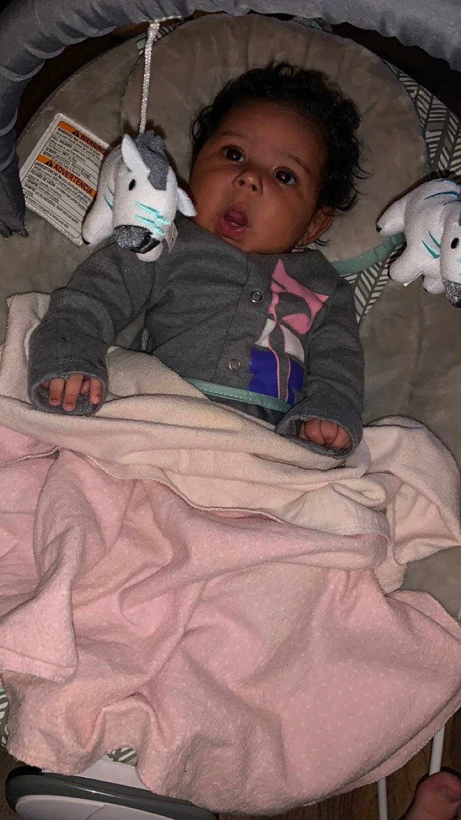 Kaliyah is registered to the contest to win money with this photo: baby, baby_toddler_clothing, bedding, cheek, child, comfort, flooring, fun, fur, head, linens, mammal, pattern, person, photograph, room, sitting, skin, sleeve, textile