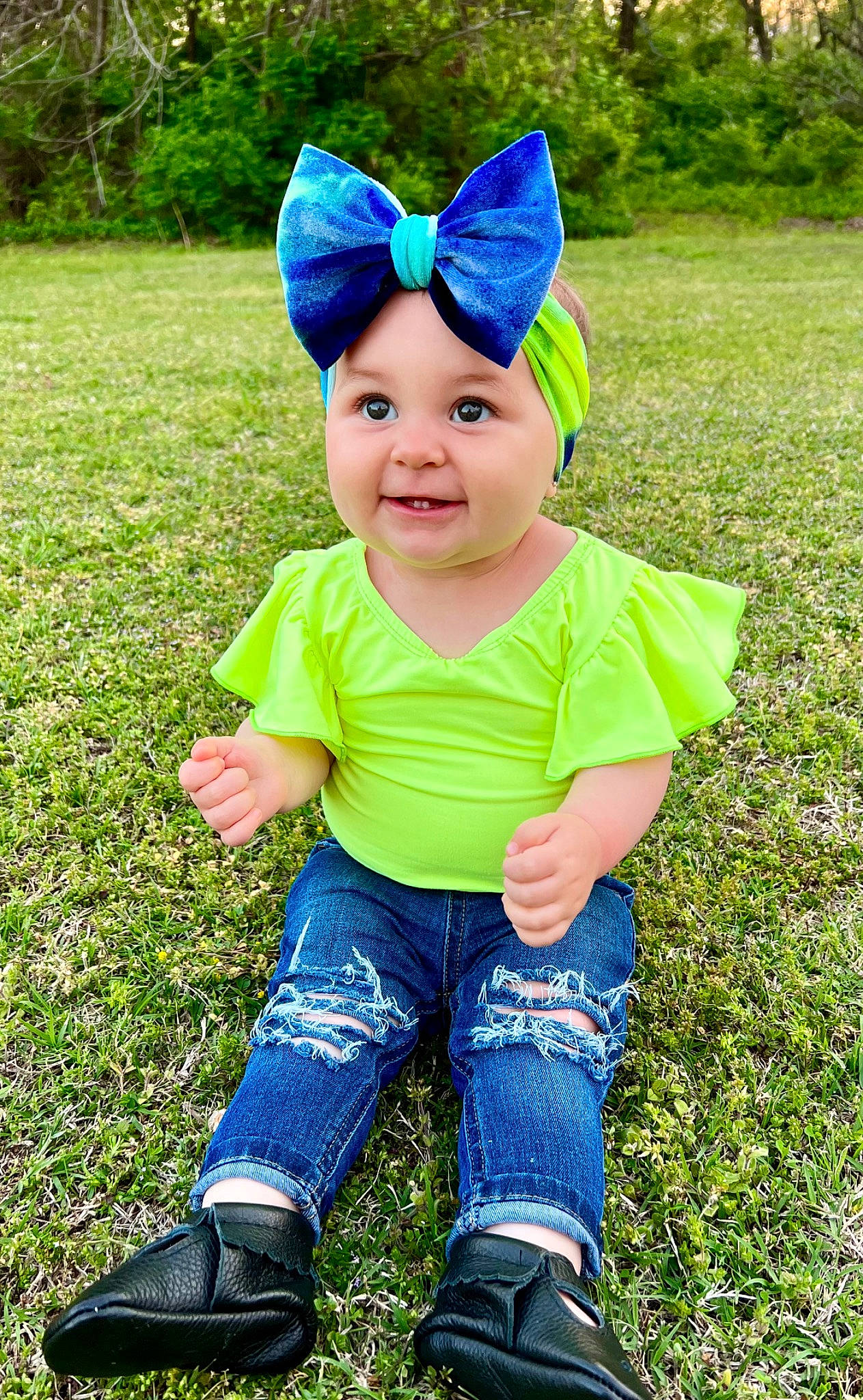Sylvia joined the competition — help win amazing prizes! baby_toddler_clothing, blue, cap, child, clothing, costume_hat, electric_blue, face, fun, grass, green, happy, headgear, headwear, jeans, joy, people_in_nature, person, photograph, plant
