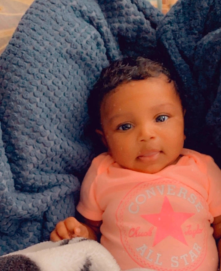 Larry is registered to the contest to win money with this photo: baby, beauty, cheek, child, eye, face, head, headgear, iris, knitting, lip, nose, person, pink, skin, textile, toddler, wool