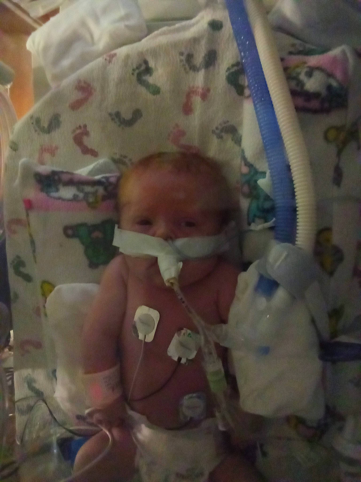 Lucius is registered to the contest to win money with this photo: baby, baby_products, baby_safety, baby_sleeping, baby_toddler_clothing, bedding, bedtime, cheek, child, comfort, head, infant_bed, linens, person, room, textile, toddler