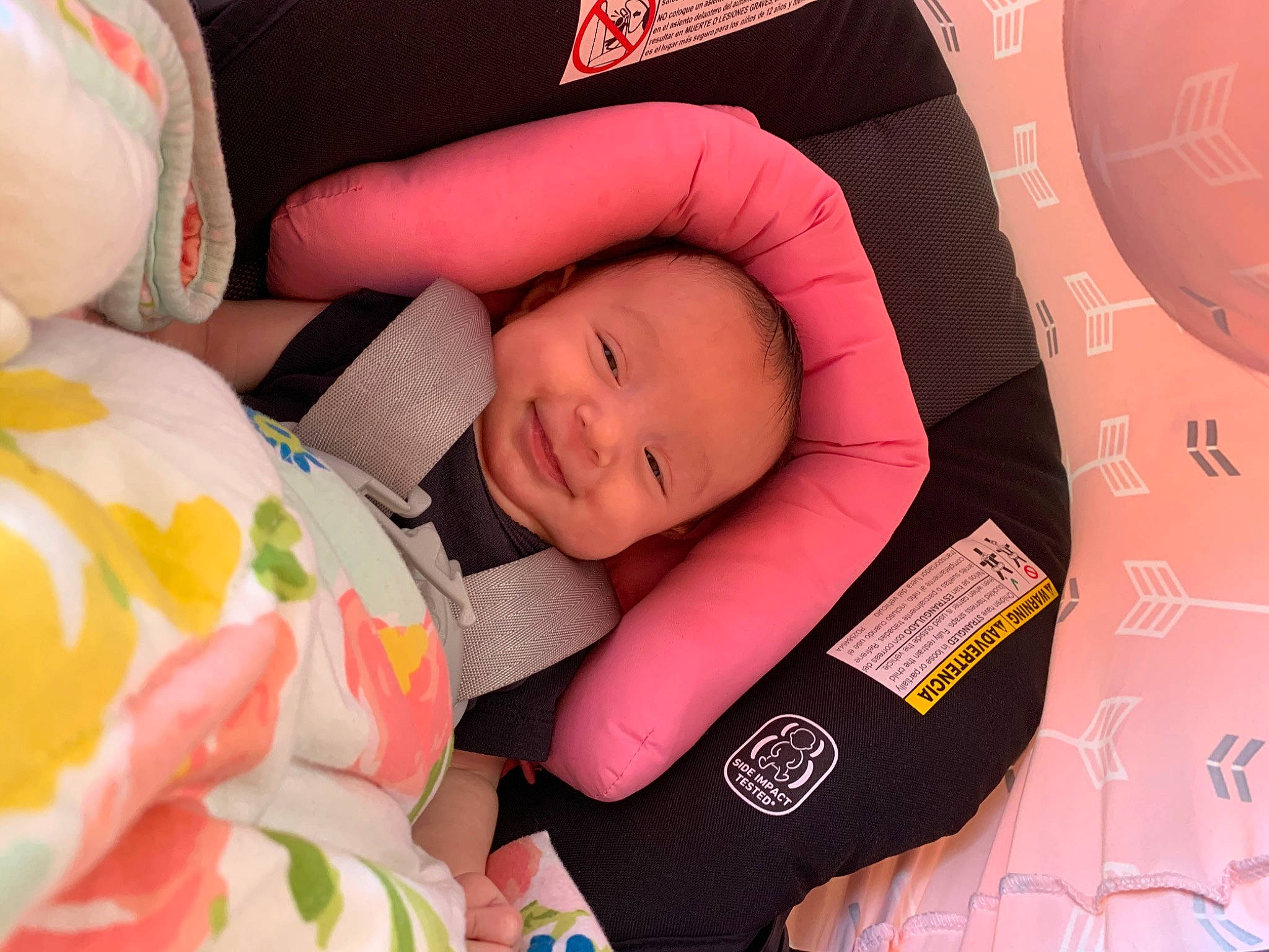 Alia is registered to the contest to win money with this photo: arm, baby, baby_carriage, baby_in_car_seat, baby_products, baby_sleeping, birth, car_seat, cheek, child, head, nap, person, pink, product, skin, sleep, textile, toddler, vacation
