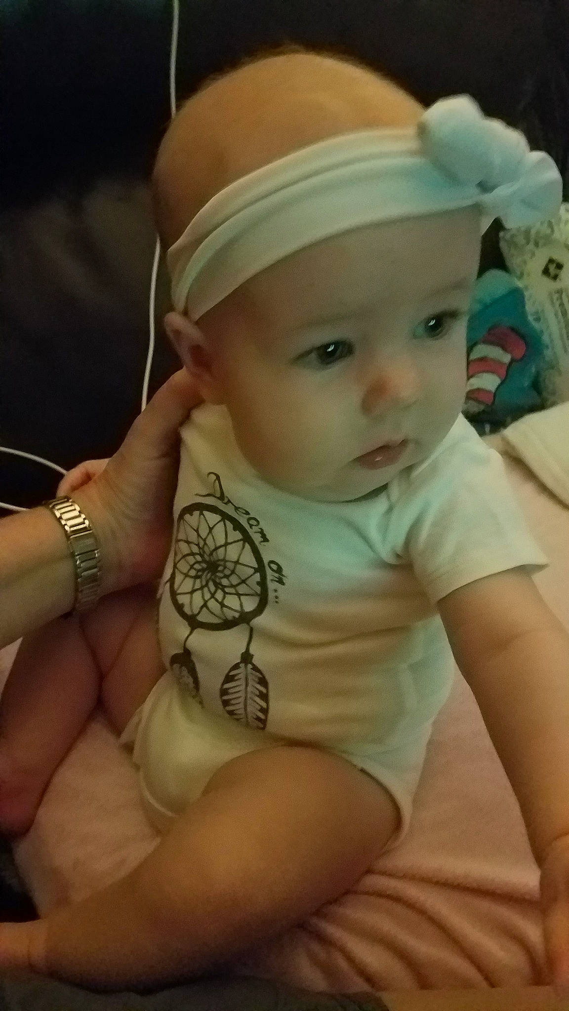 Gabby is registered to the contest to win money with this photo: arm, baby, blond, cheek, child, ear, eye, eyebrow, face, forehead, hand, head, headgear, headwear, joint, leg, lip, mouth, nose, person