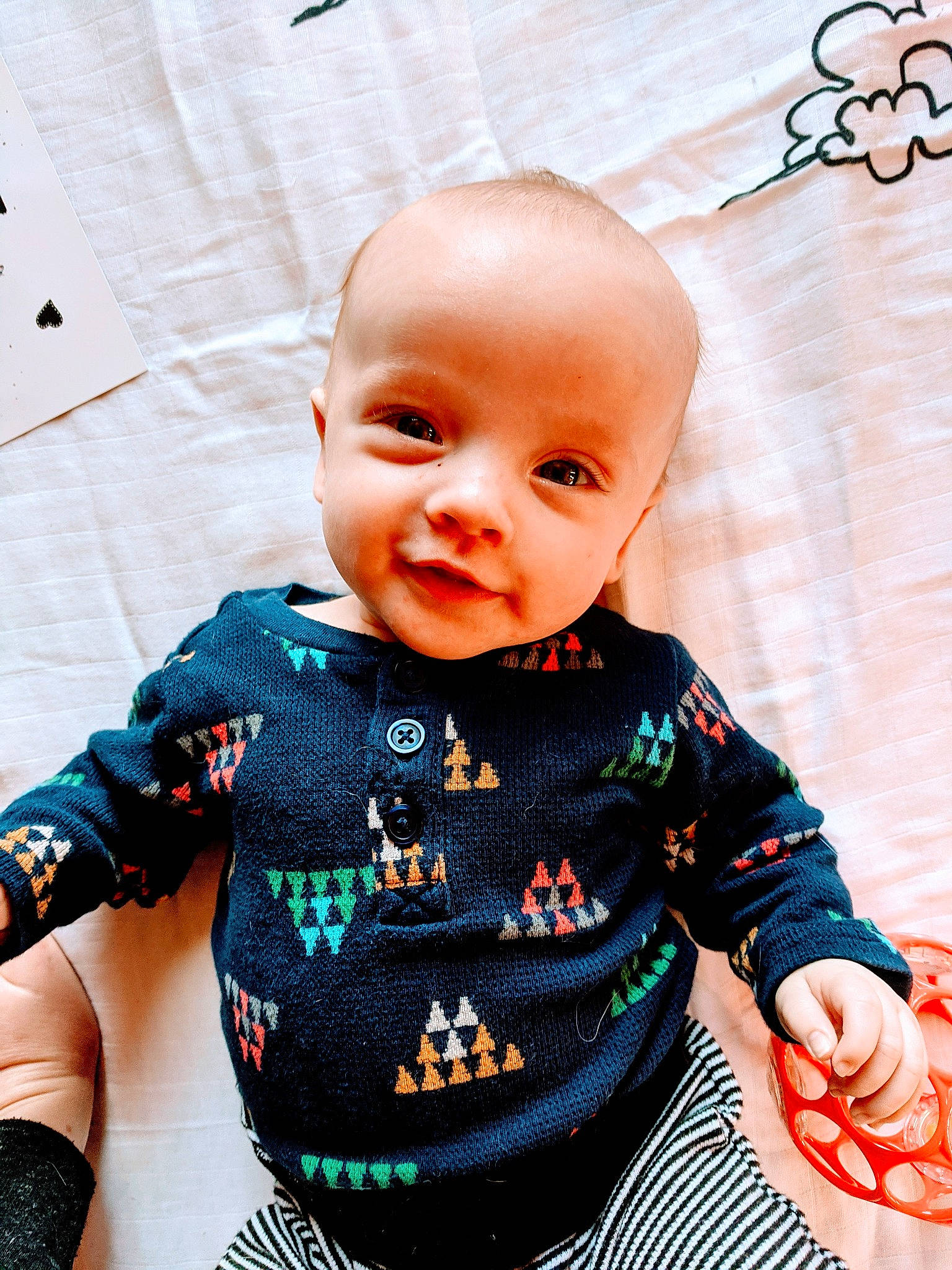 Rhys joined the competition — help win amazing prizes! baby, baby_toddler_clothing, cheek, eye, face, facial_expression, green, happy, human_body, iris, neck, nose, person, pink, skin, sleeve, smile, t_shirt, textile, toddler