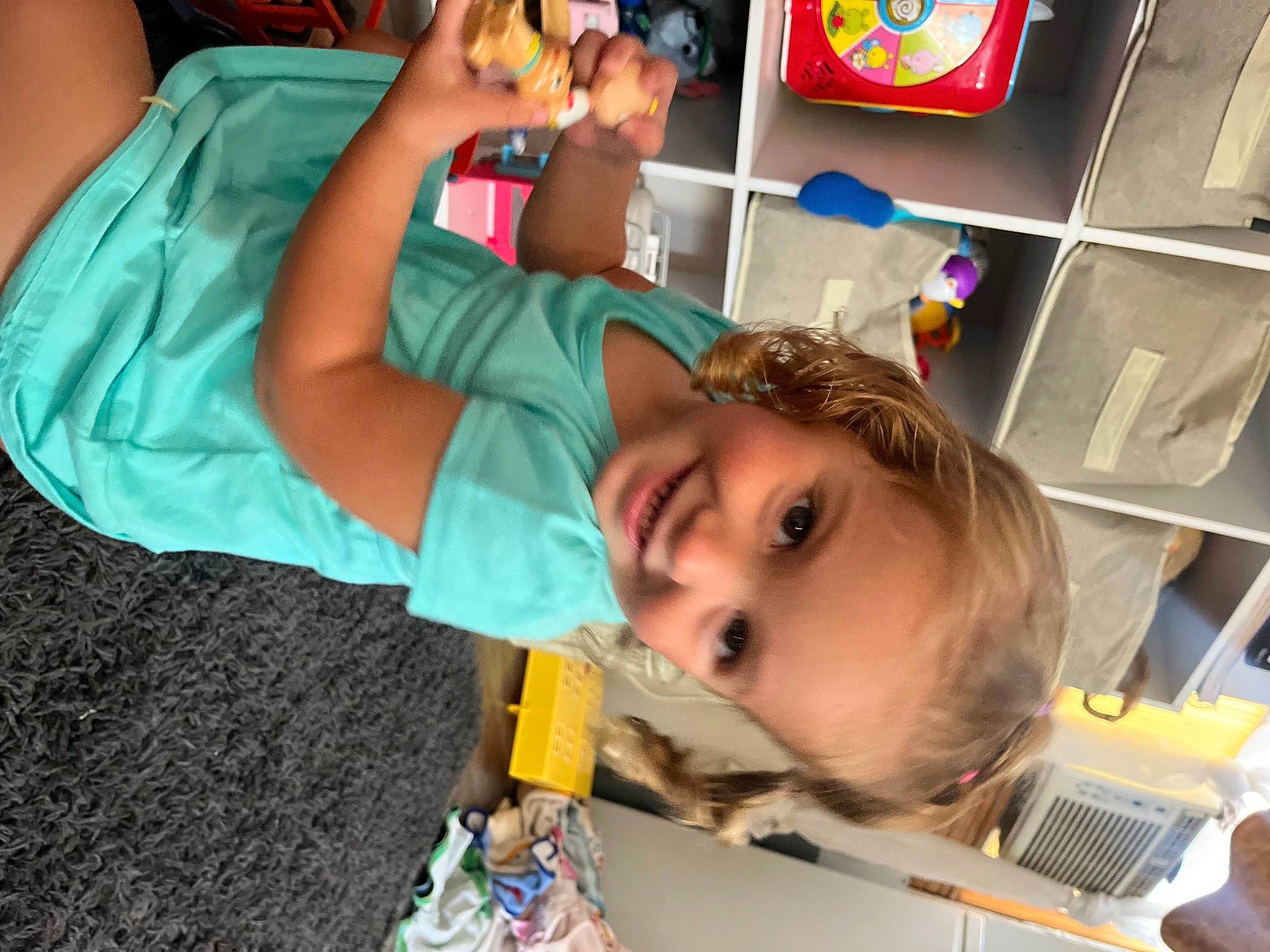 Adalyn is registered to the contest to win money with this photo: child, eyelash, fun, happy, joy, kindergarten, leisure, mouth, person, play, room, smile, t_shirt, toddler, water
