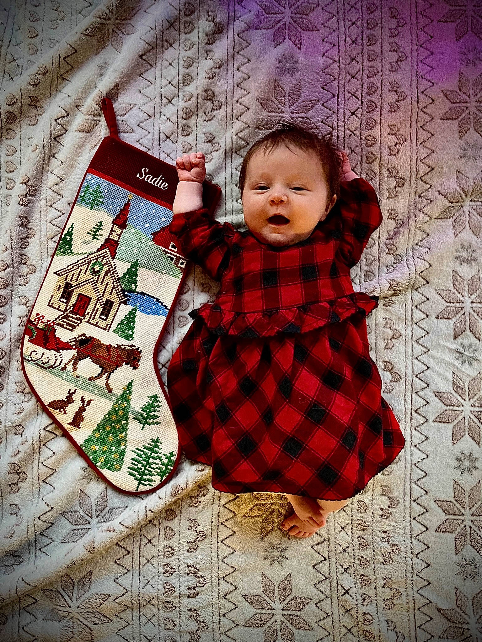 Sadie joined the competition — help win amazing prizes! baby, baby_toddler_clothing, child, clothing, craft, dress, flooring, linens, magenta, outerwear, pattern, person, plaid, plant, rectangle, room, sleeve, tartan, toddler, tree