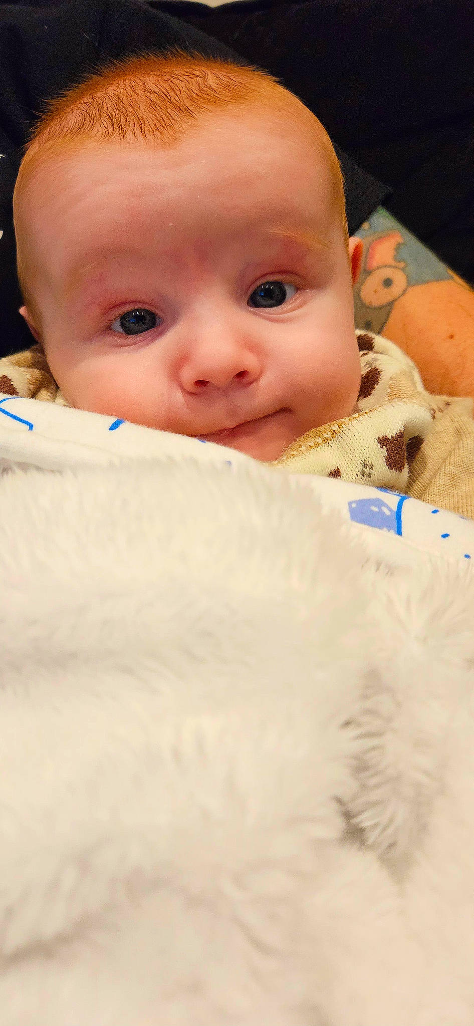 Loki is registered to the contest to win money with this photo: baby, baby_toddler_clothing, cheek, child, chin, comfort, eyebrow, eyelash, facial_expression, flooring, fur, happy, iris, linens, lip, nose, person, room, skin, smile
