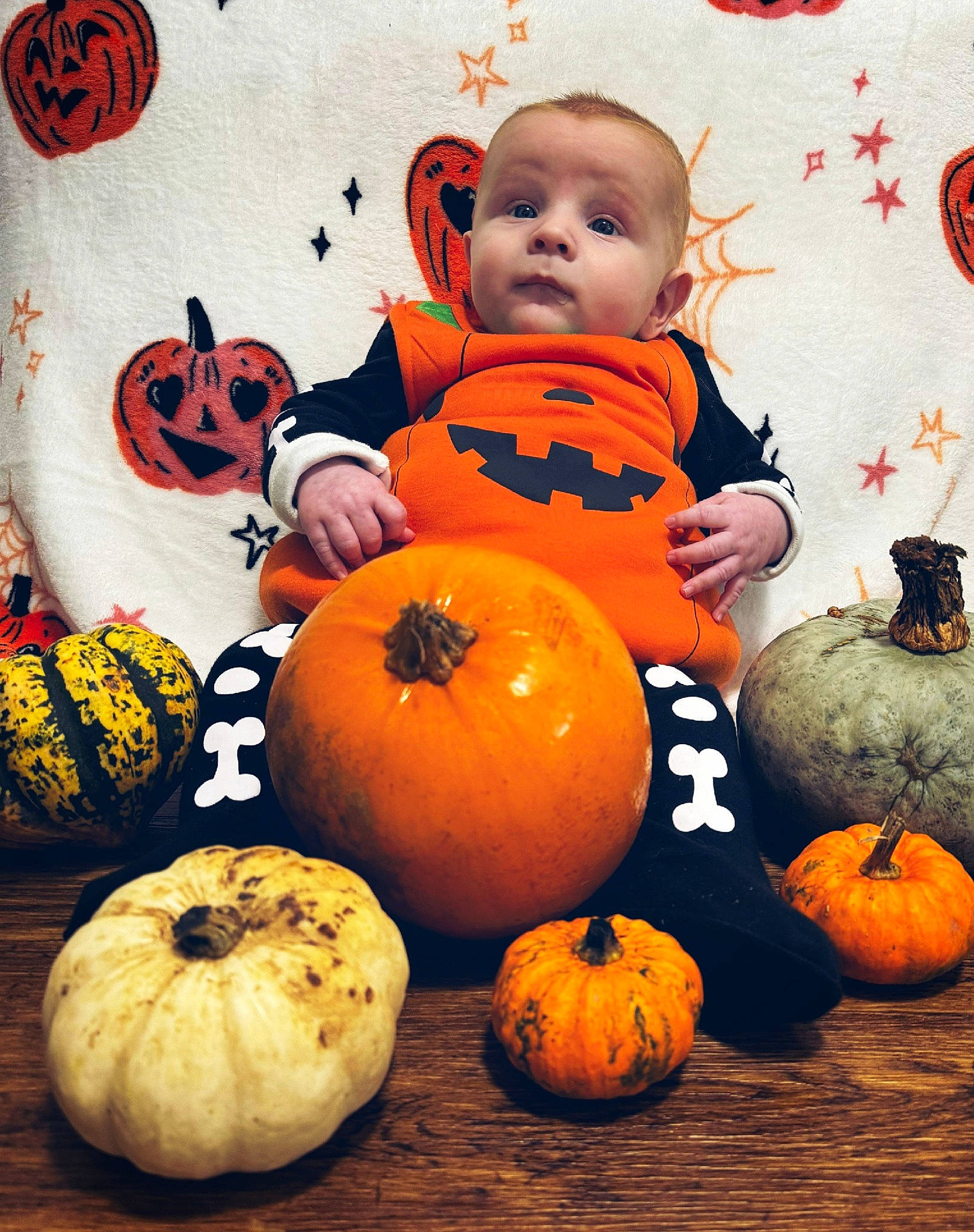 Loki is registered to the contest to win money with this photo: art, calabaza, creative_arts, cucurbita, eye, face, gourd, green, happy, head, human_body, natural_foods, orange, person, plant, pumpkin, squash, staple_food, toddler, vegetable