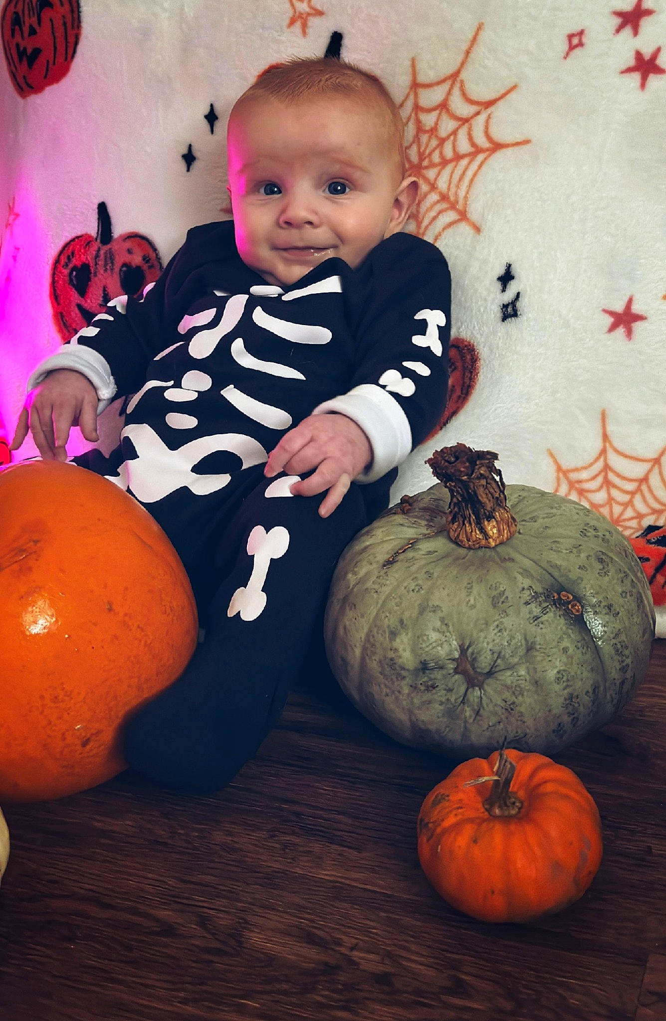 Loki joined the competition — help win amazing prizes! baby_toddler_clothing, calabaza, child, cucurbita, eye, facial_expression, gourd, happy, head, natural_foods, orange, organ, person, plant, pumpkin, room, smile, squash, toddler, vegetable