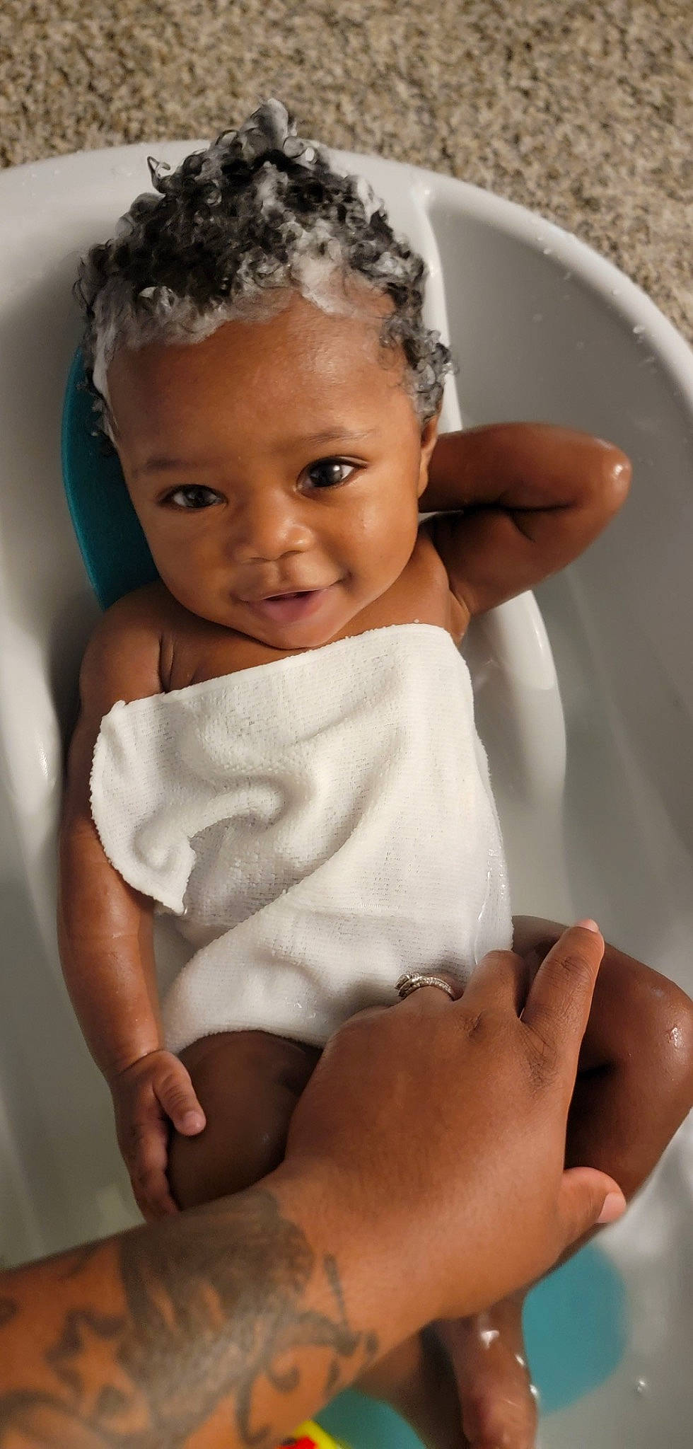 Leah is registered to the contest to win money with this photo: baby_toddler_clothing, cheek, chin, eye, eyebrow, eyelash, face, finger, flash_photography, gesture, hairstyle, hand, head, leg, lip, neck, nose, person, skin, stomach