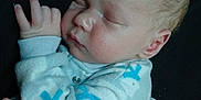 Karter is registered to the contest to win money with this photo: baby, blanket, bodypart, clothing, face, finger, glove, hand, head, newborn, person, photography, portrait, sleeping, wrist
