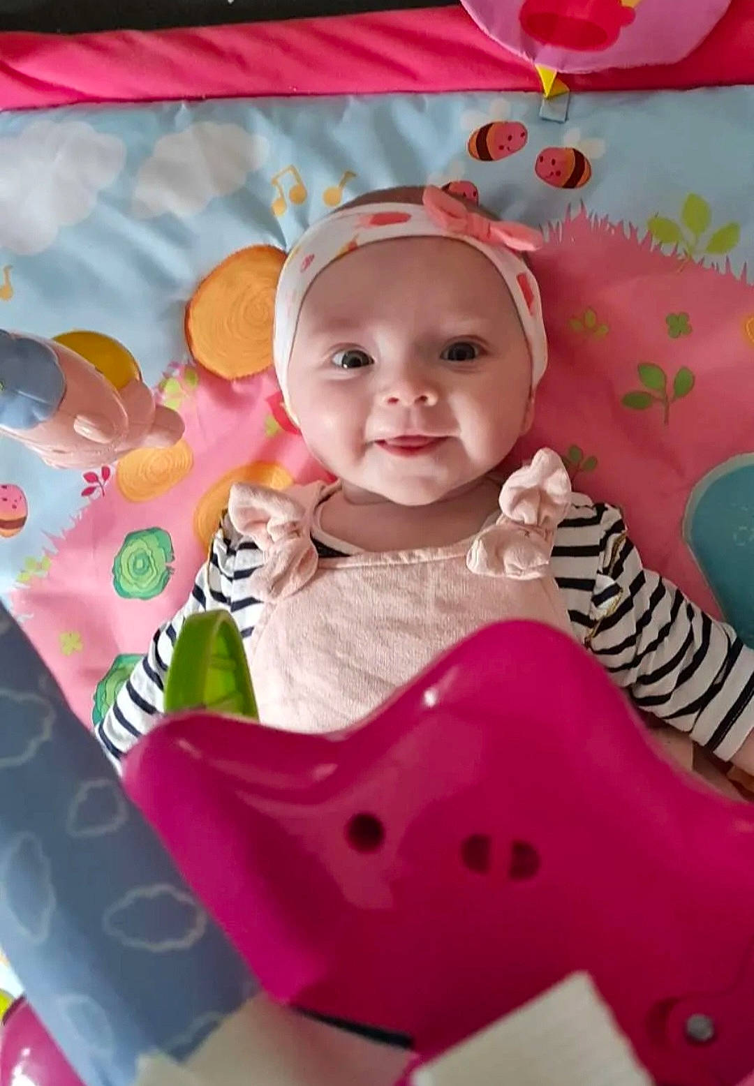 Atilya a rejoint le concours — aidez-le/la à gagner de superbes lots ! baby, baby_playing_with_toys, baby_products, baby_toddler_clothing, baby_toys, cheek, child, event, fun, happy, headwear, magenta, person, pink, red, riding_toy, skin, sleeve, smile, textile