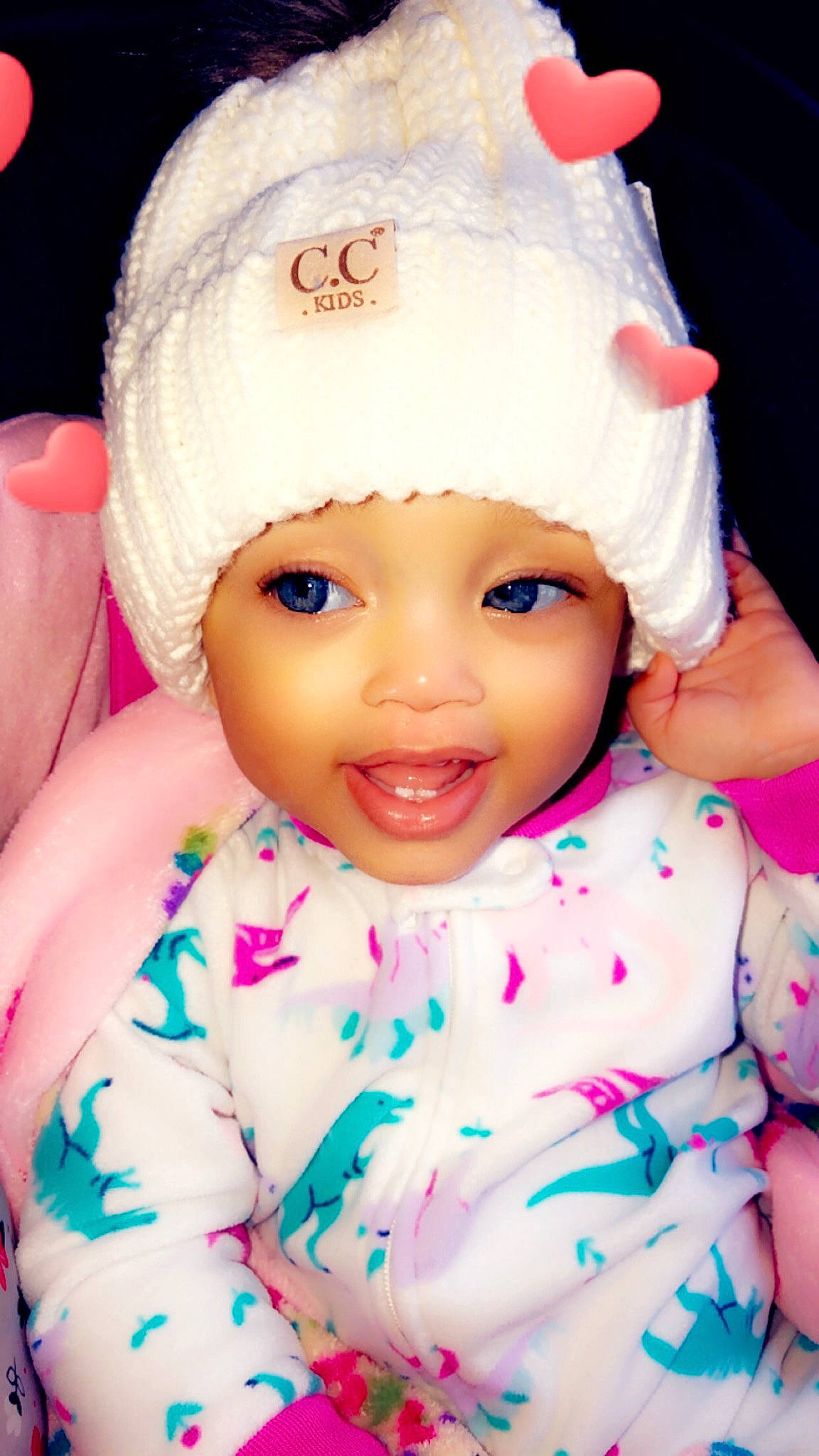 Haiden is registered to the contest to win money with this photo: cheek, child, doll, girl, headwear, human_hair_color, infant, iris, person, pink, skin, smile, toddler, toy