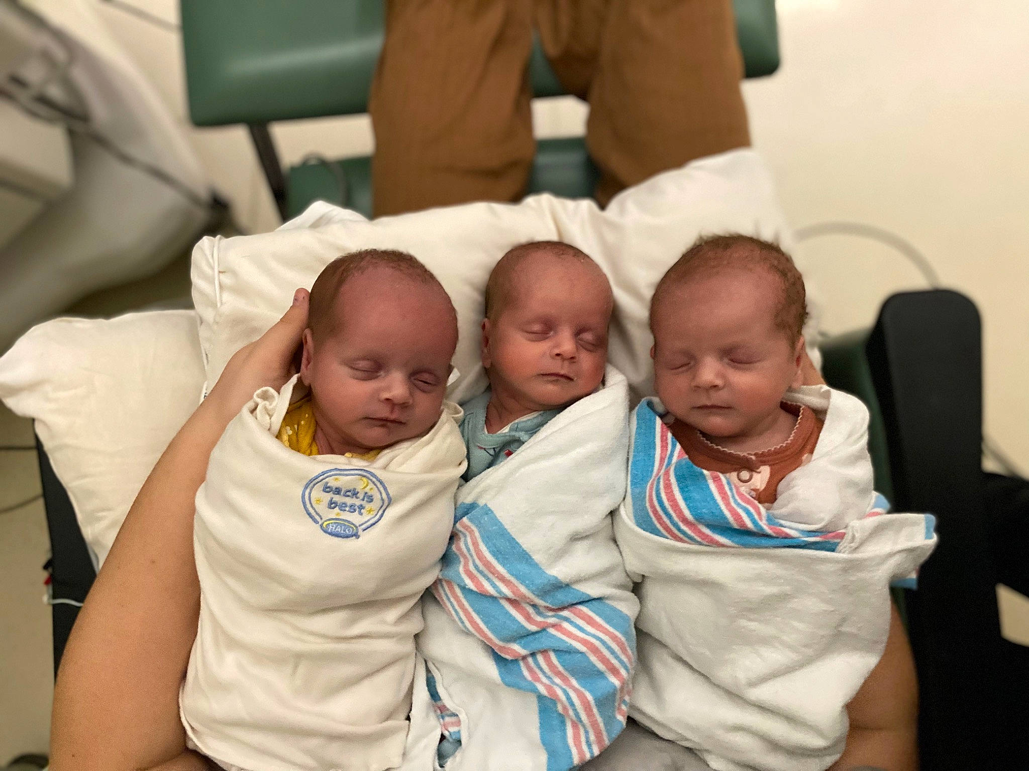 Gracelynn-ryleigh-briella is registered to the contest to win money with this photo: abdomen, baby, baby_products, baby_toddler_clothing, chair, cheek, child, comfort, event, family, fun, happy, linens, person, room, sitting, skin, t_shirt, toddler