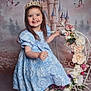 Kenzie joined the competition — help win amazing prizes! child, girl, princess, dress, crown, smile, barefoot, flowers, decorative_cart, castle_backdrop, butterflies, portrait, happy, posing, indoor, fairy_tale, blue_dress, long_hair, cute, young