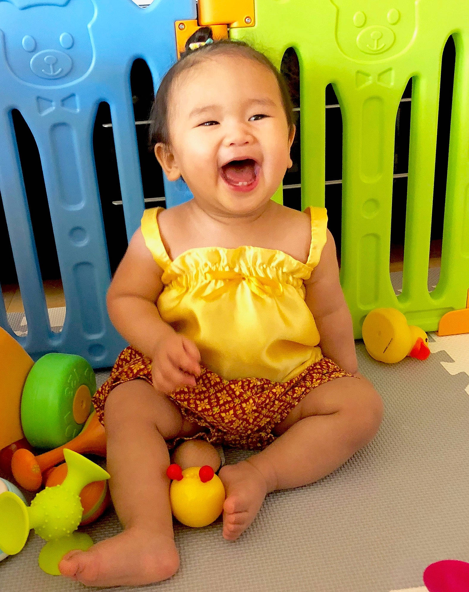 Avalyn joined the competition — help win amazing prizes! baby, baby_playing_with_toys, baby_toddler_clothing, chair, child, facial_expression, finger, fun, green, happy, organ, person, photograph, play, room, smile, snapshot, thigh, toddler, toy