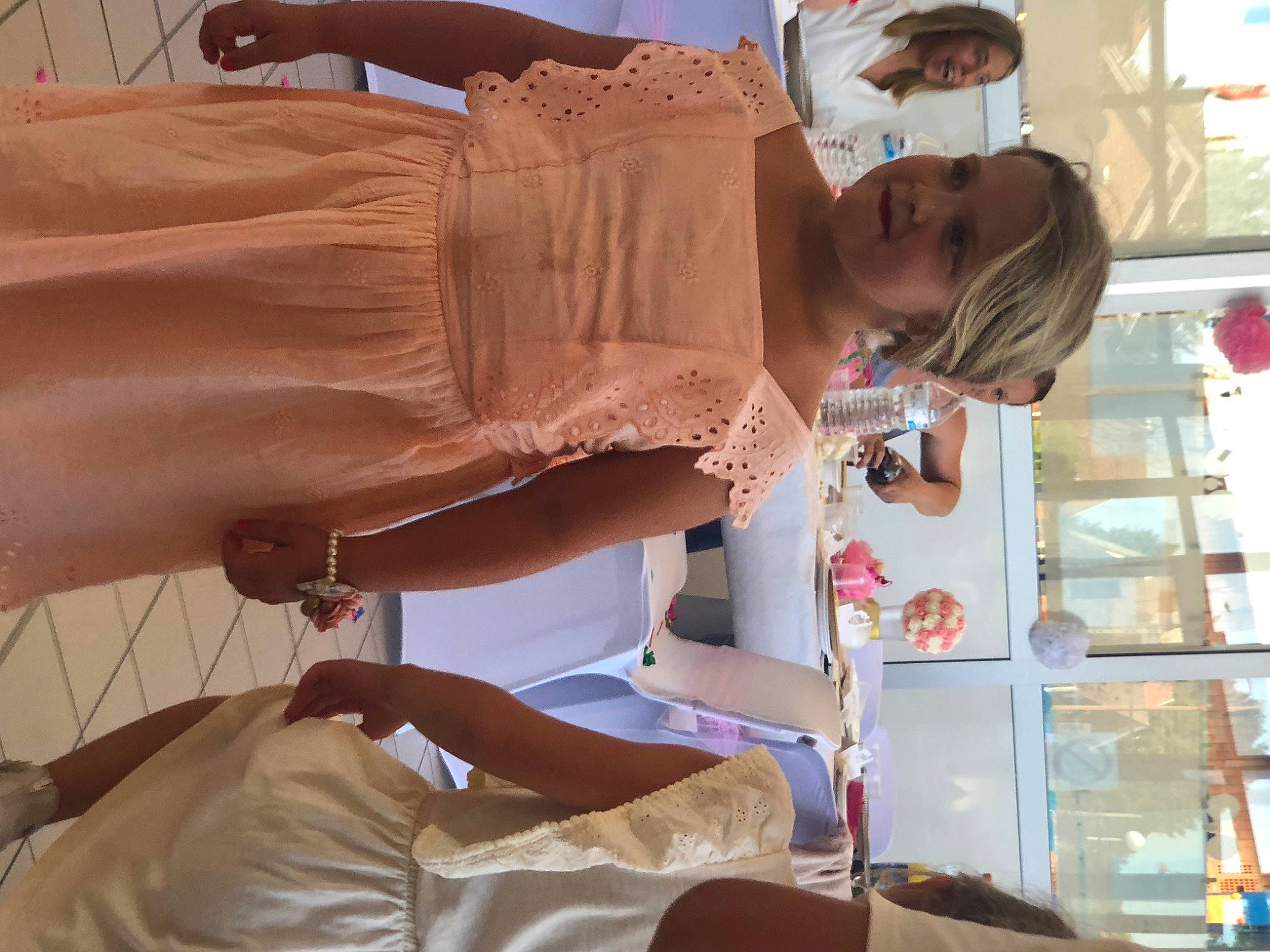 Capucine participe au concours pour gagner de l'argent avec cette photo : bridal_accessory, bride, chair, dress, elbow, fashion_design, flesh, fun, hat, joy, peach, person, room, tableware, temple, waist, wedding_dress, white, wrist