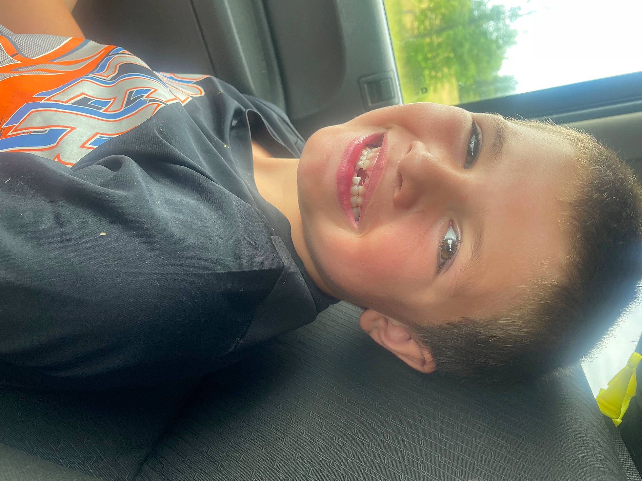 Jackson joined the competition — help win amazing prizes! automotive_design, automotive_exterior, black_hair, car, car_seat, chest, comfort, cool, eyebrow, family_car, forehead, fun, jaw, joy, mouth, nose, person, personal_protective_equipment, plant, smile
