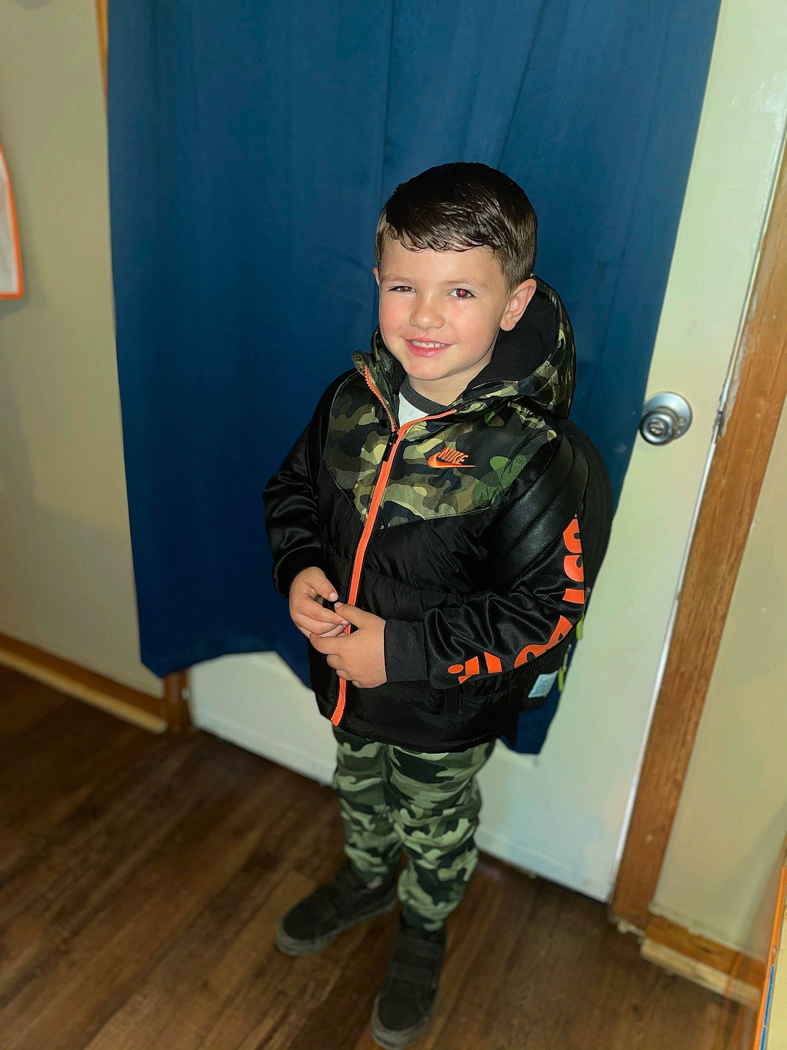 Jackson joined the competition — help win amazing prizes! child, flooring, fun, hardwood, hat, jacket, joy, laminate_flooring, leg, military_camouflage, military_person, military_uniform, person, personal_protective_equipment, sleeve, smile, soldier, toddler, varnish, wood