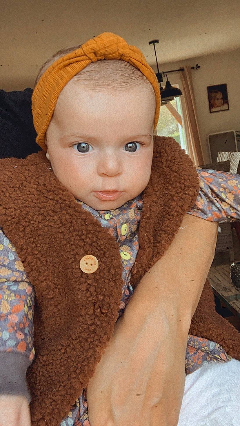 Selena participe au concours pour gagner de l'argent avec cette photo : cheek, chin, doll, eye, eyebrow, eyelash, face, forehead, hairstyle, head, iris, lip, mammal, neck, nose, outerwear, person, picture_frame, skin, sleeve