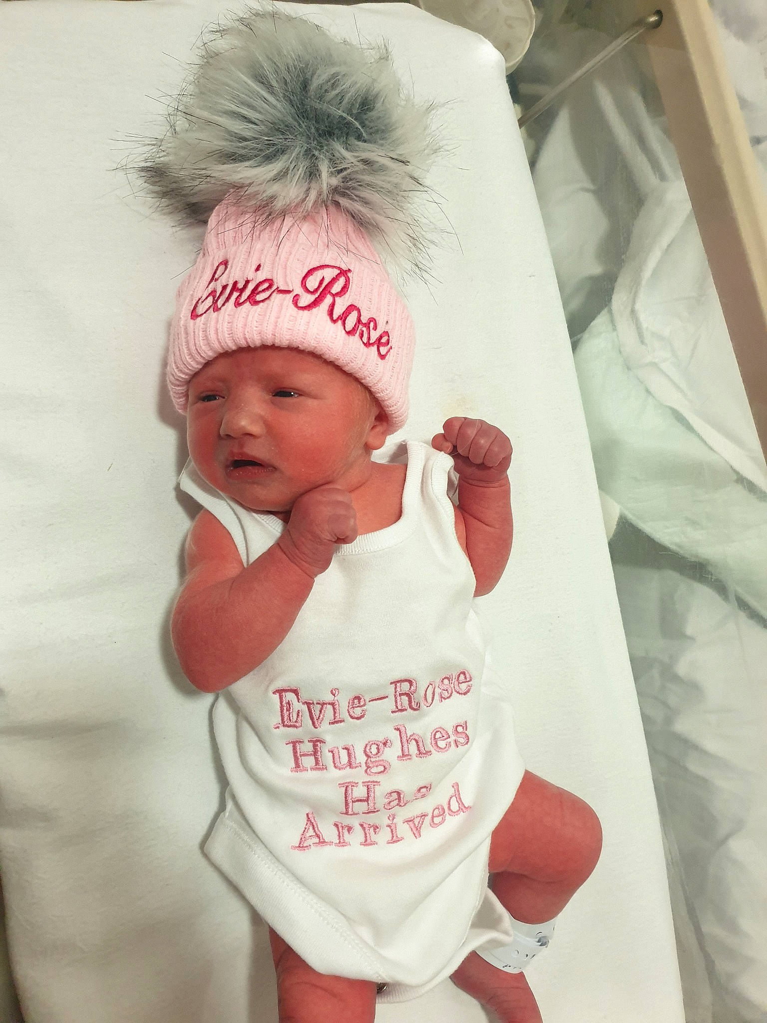 Evie-rose is registered to the contest to win money with this photo: baby, baby_products, baby_toddler_clothing, bonnet, child, clothing, cool, headgear, headwear, knit_cap, outerwear, person, pink, product, sleeve, toddler